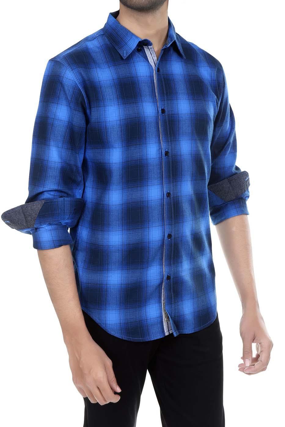 Blue and dark check button-up shirt with long sleeves and folded cuffs