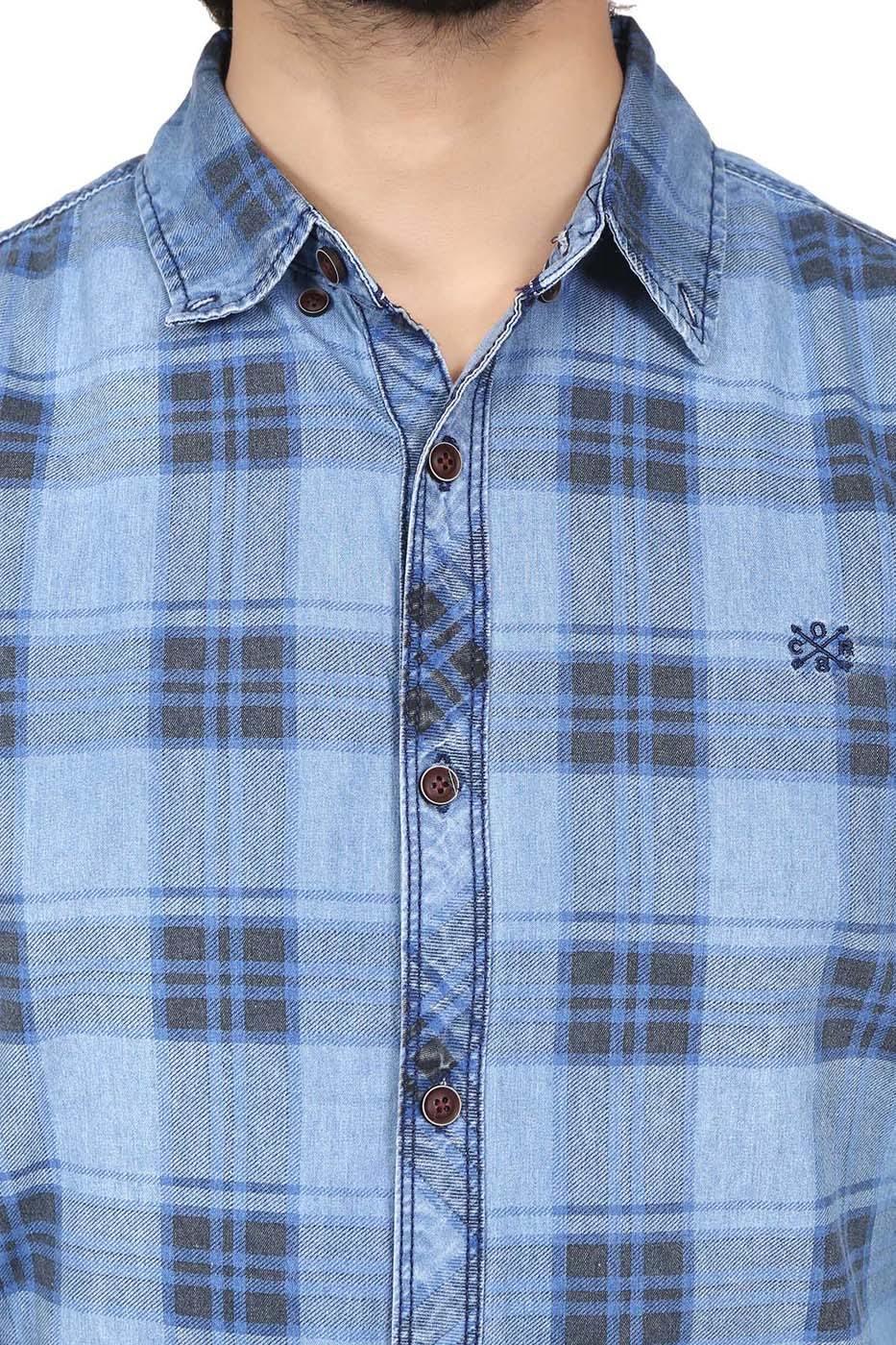 Placket and chest of denim-blue plaid casual shirt with brown button details