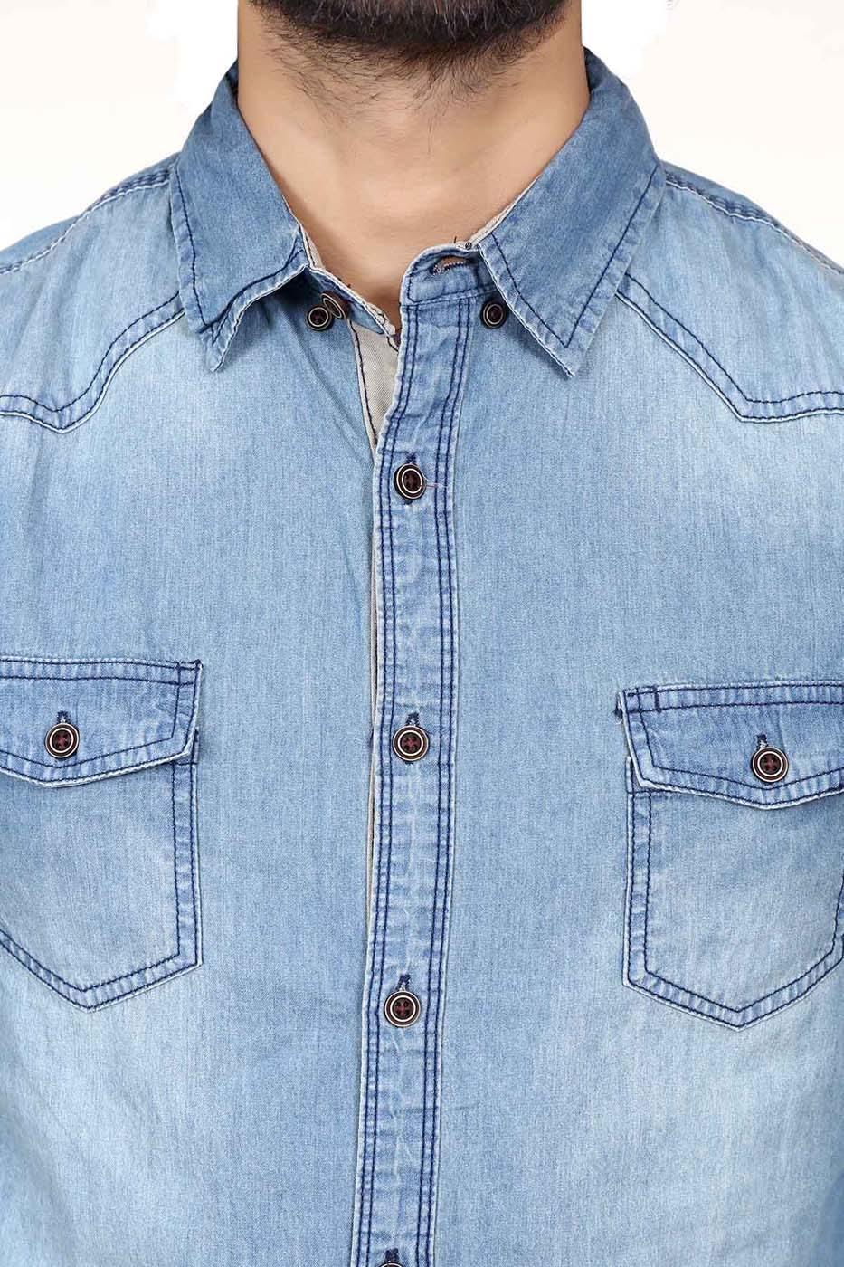 Light blue denim casual shirt with two chest flap pockets and button placket