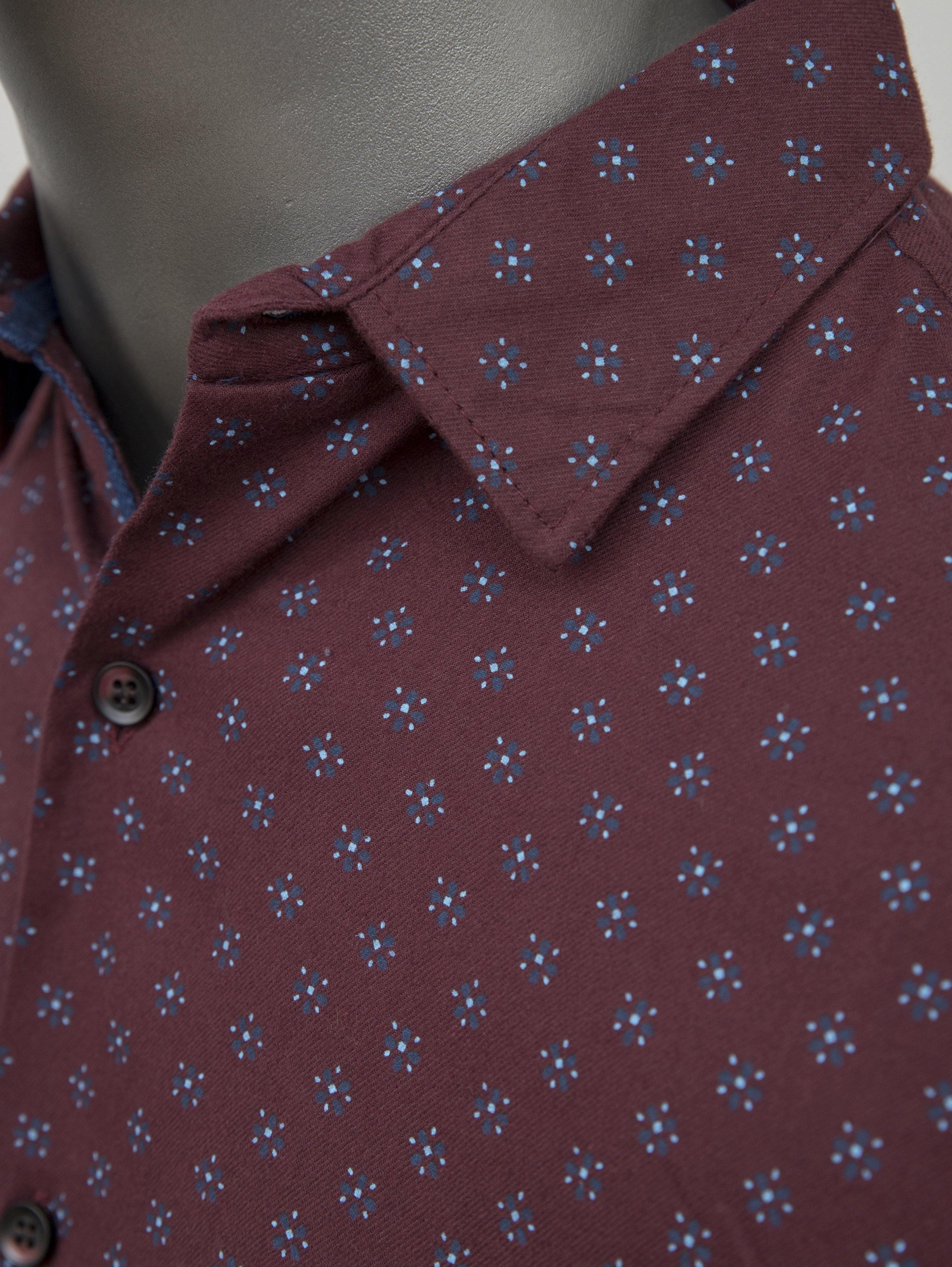Maroon patterned casual shirt button and spread collar close-up