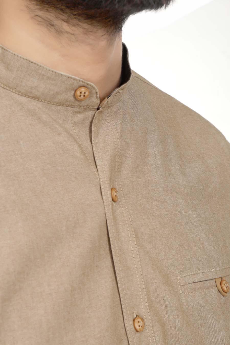 Khaki casual button-up shirt detail: button front and side chest pocket
