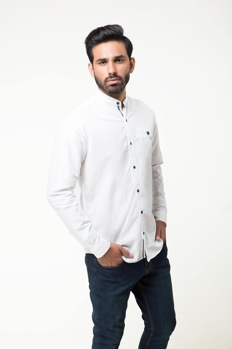 White casual full-sleeve shirt with button front, chest pocket, and cuffs