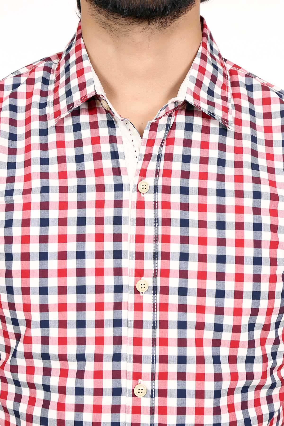 Close-up of red, navy & white check button front on a casual shirt