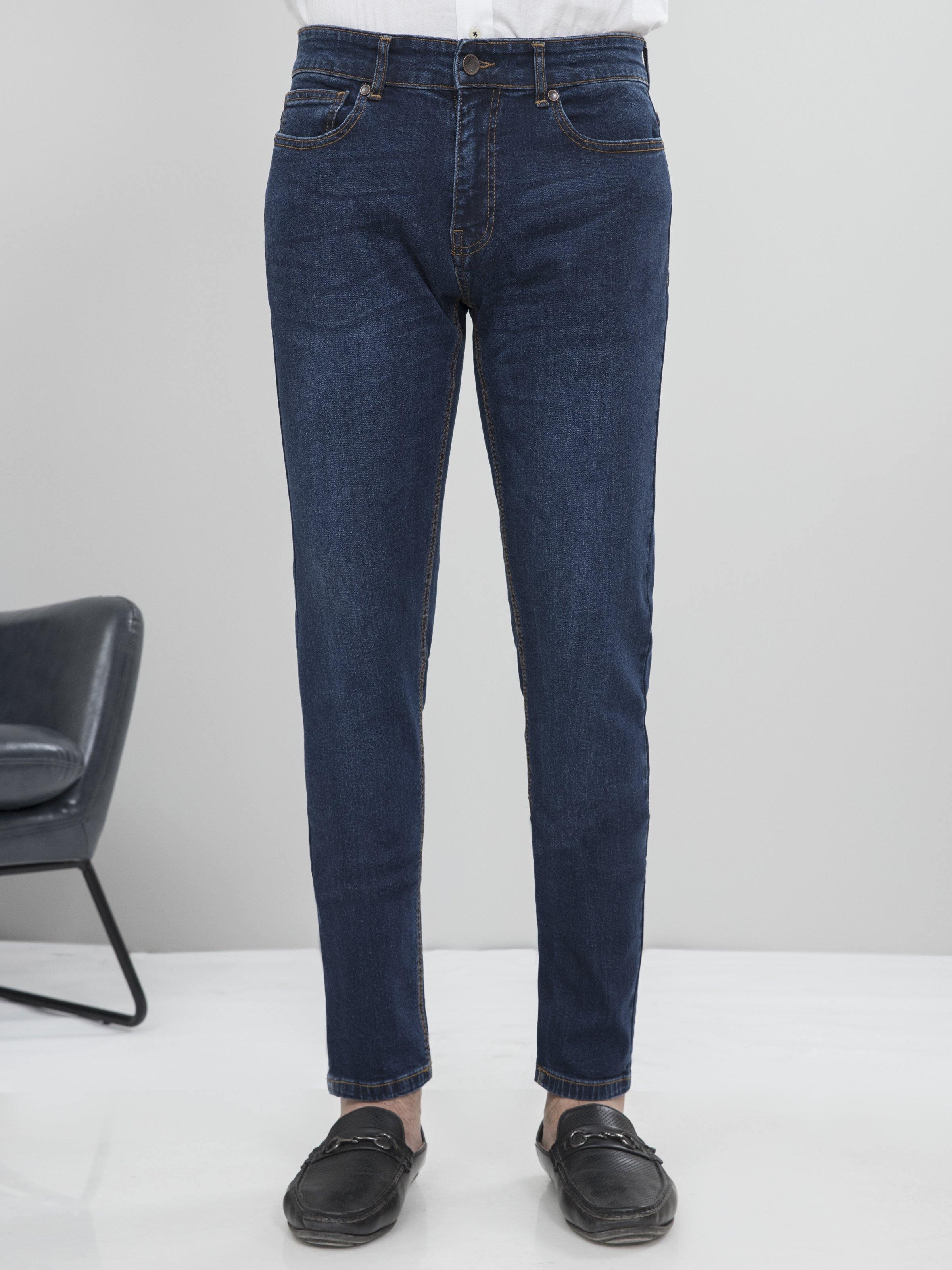 Dark blue slim-fit jeans with five-pocket styling and belt loops