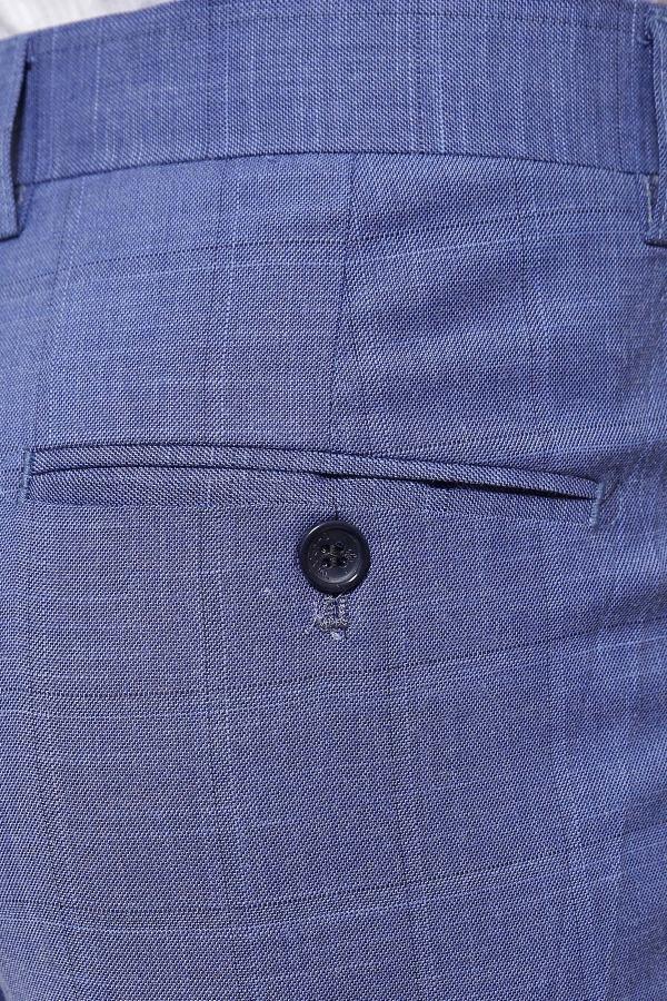 Blue dress pants waistband with front button and belt loops