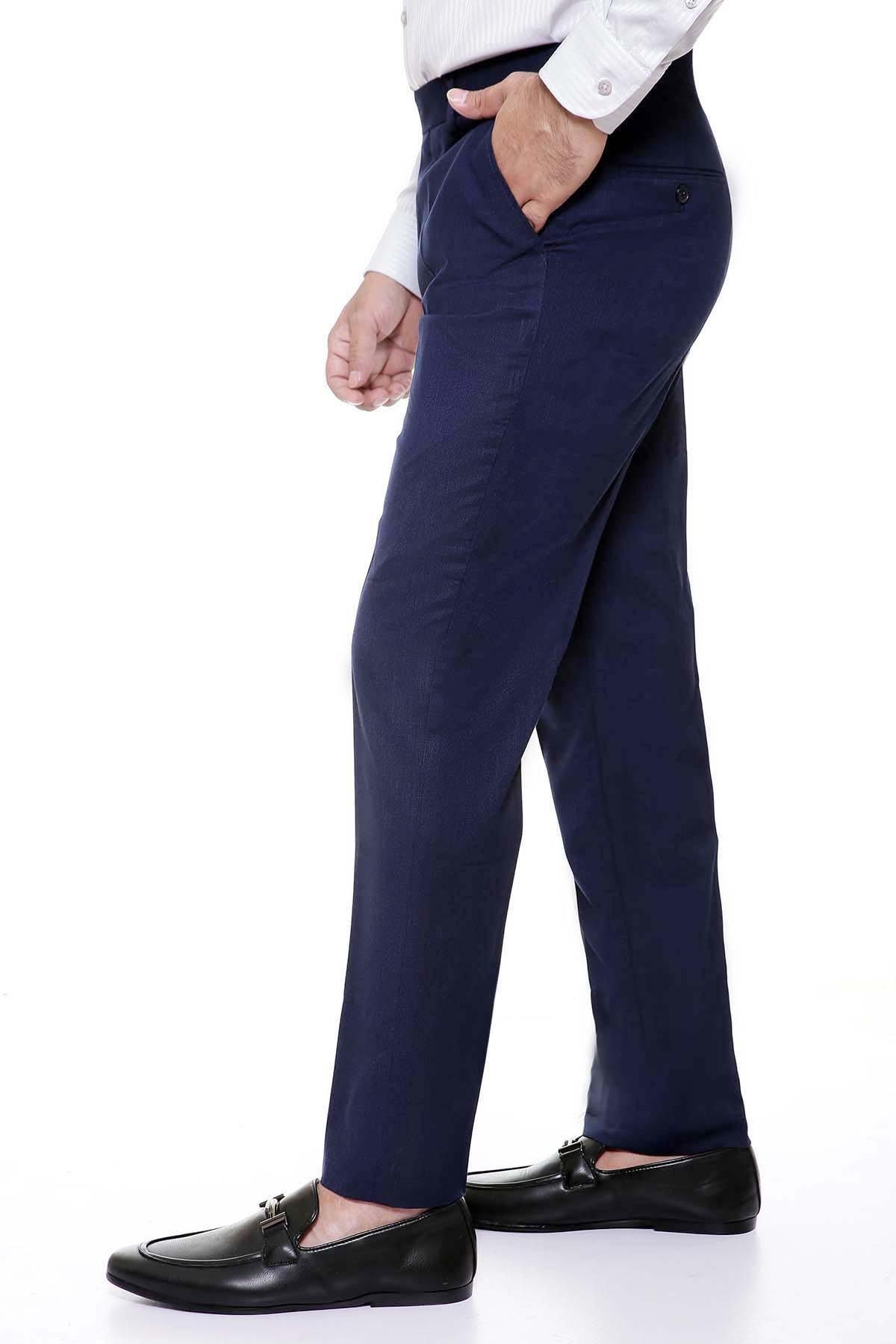 Navy smart-fit dress pants shown at side seam with belt loops