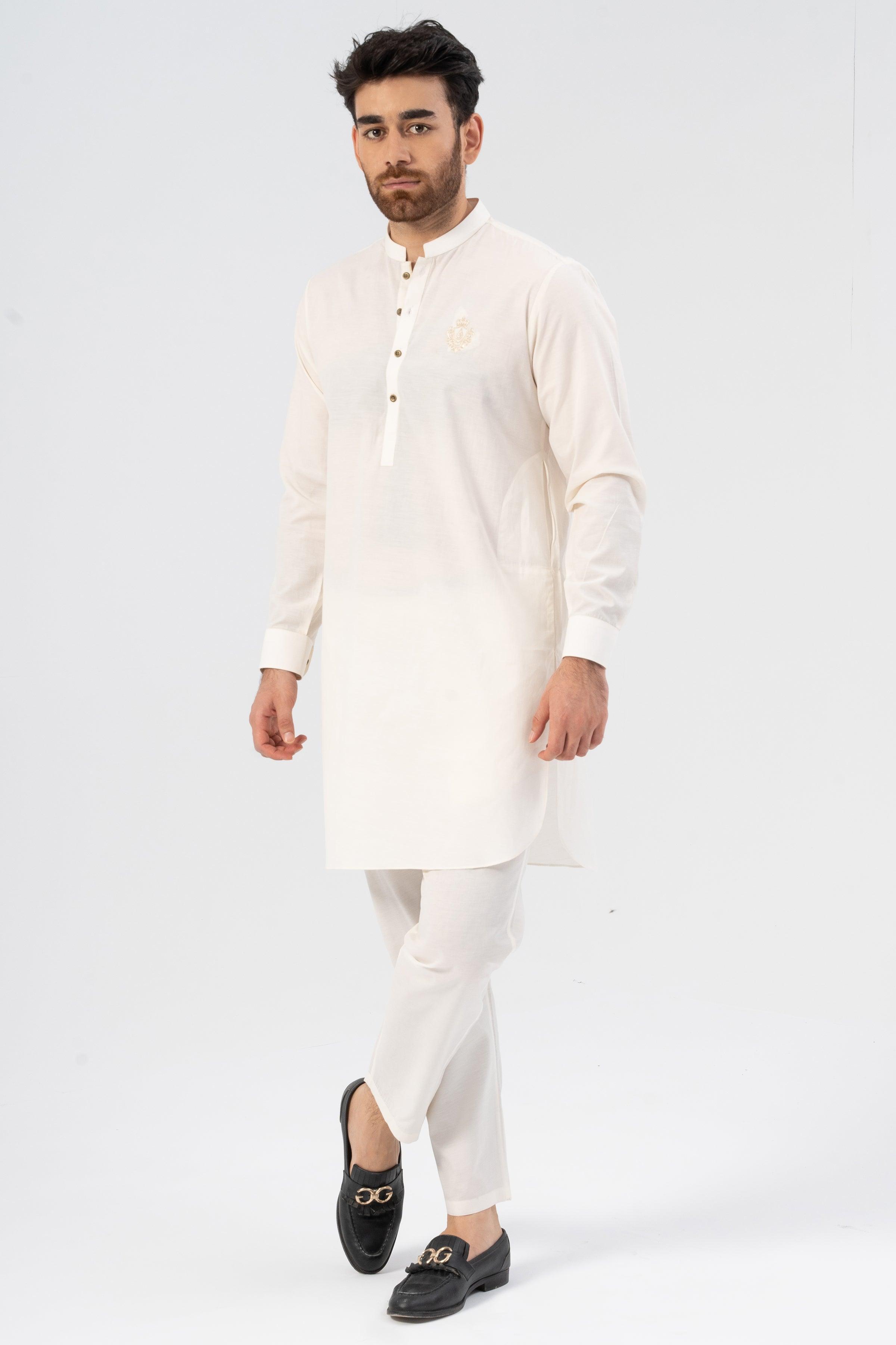 Embroidered white kurta pajama set with long sleeves and button front, full-length view
