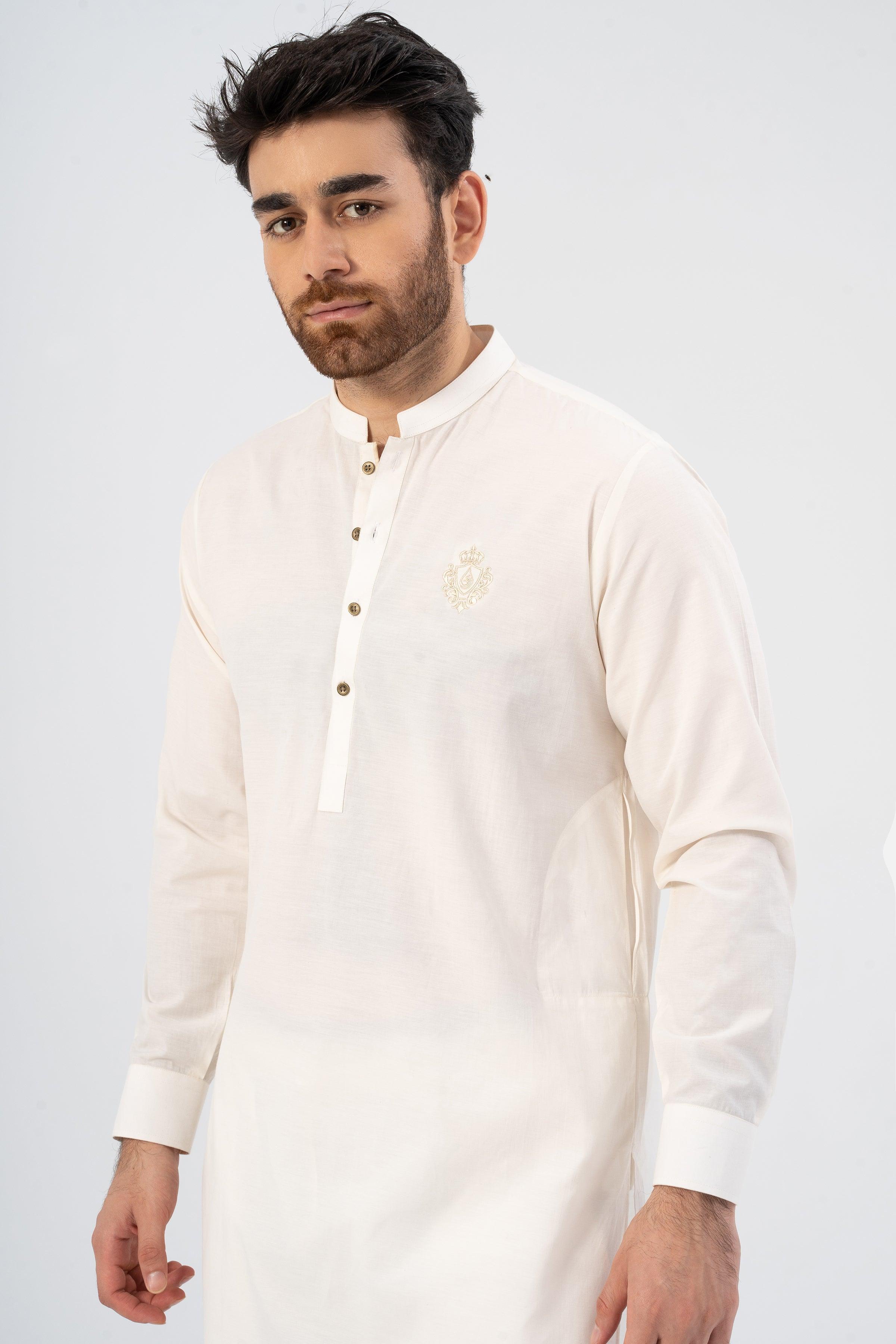 Embroidered white kurta with button placket and subtle chest motif, close-up front