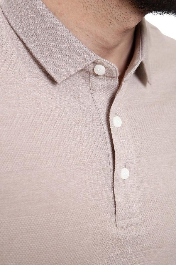 Light brown polo shirt neckline with buttoned placket and collar