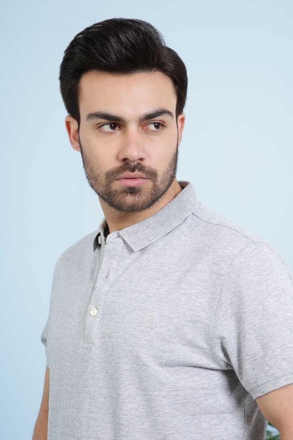 Light grey polo shirt with folded collar and button placket, close-up
