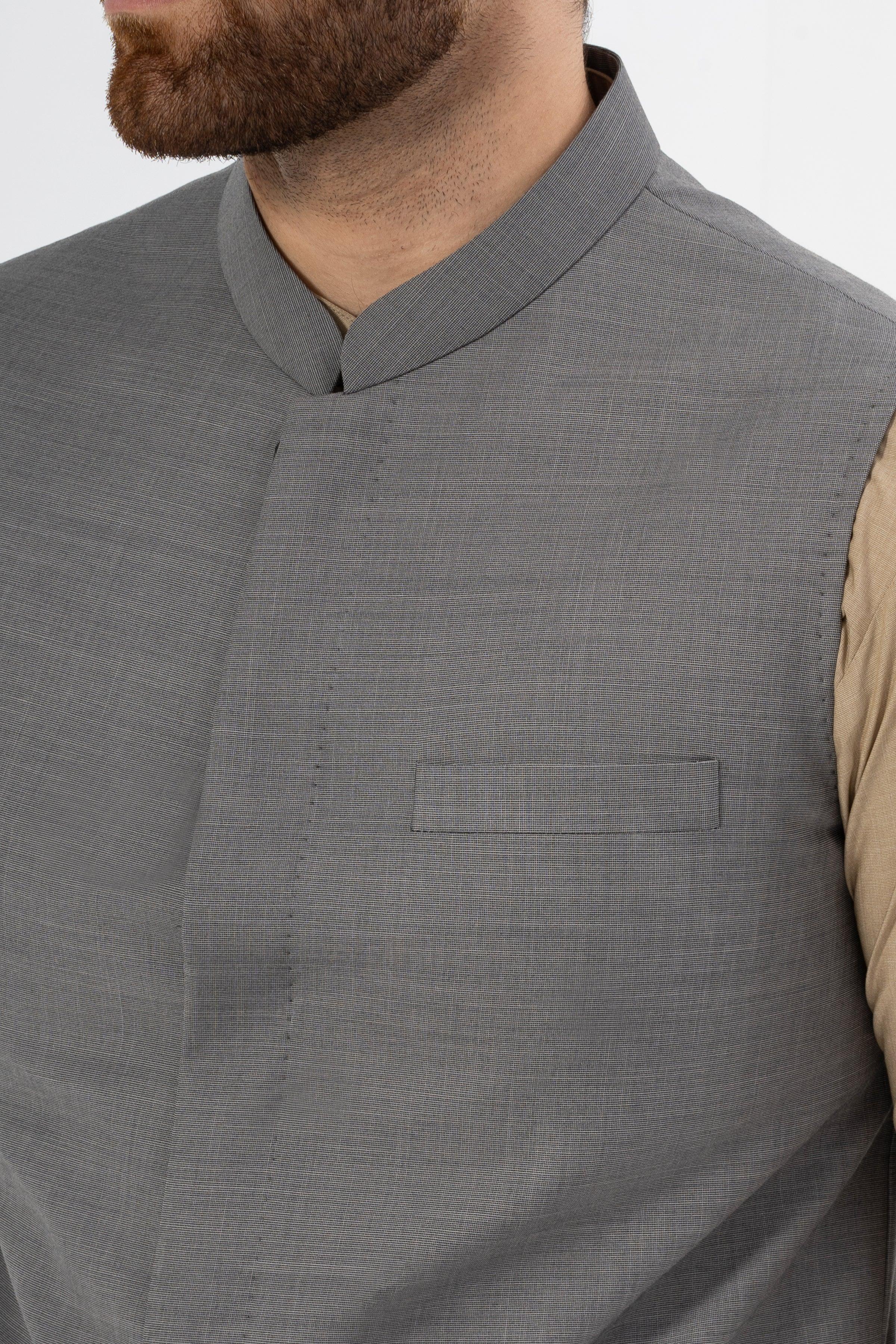Grey textured waistcoat front with chest pocket and button placket