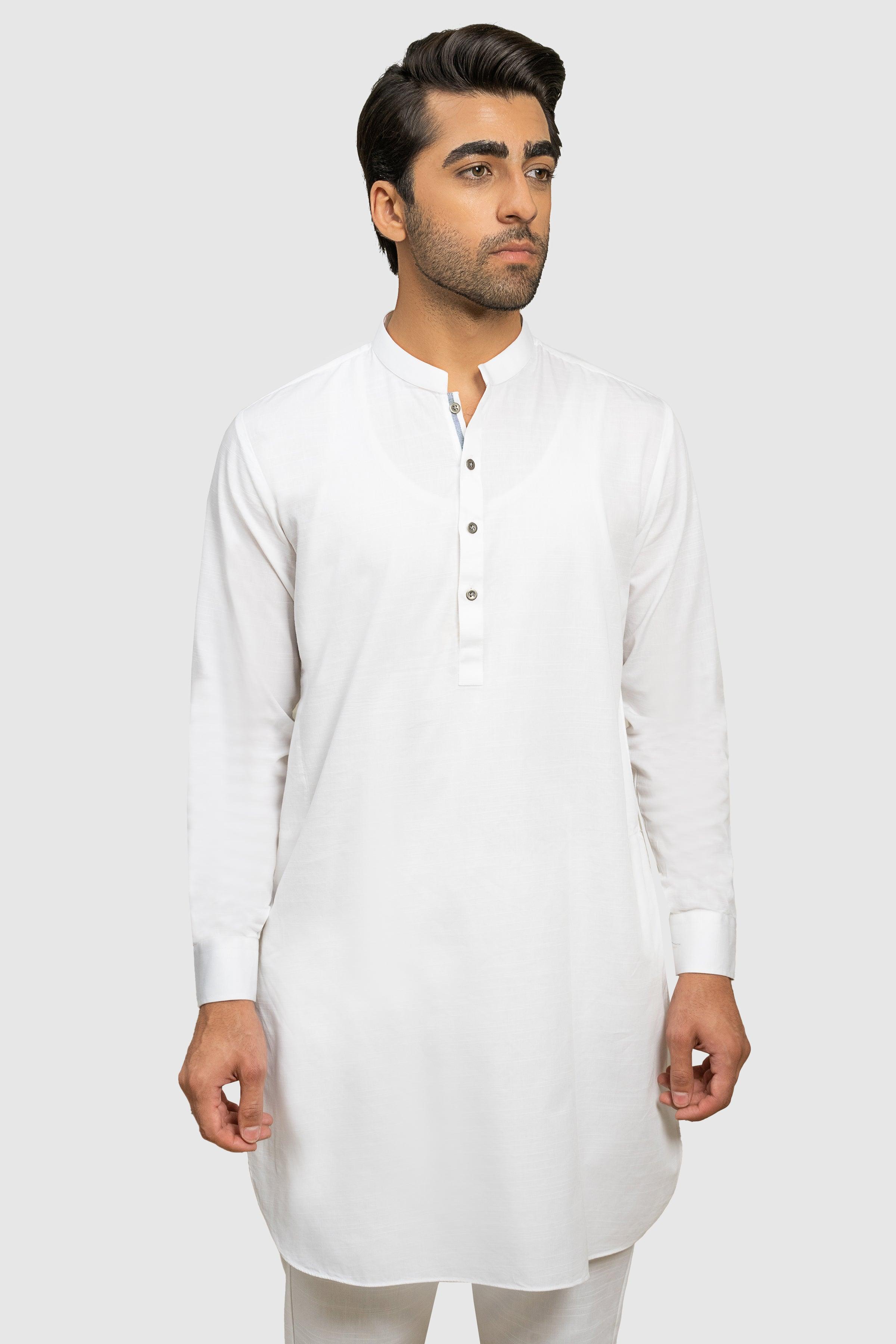 White textured kurta with button-front placket and side slit, worn with pajama pants