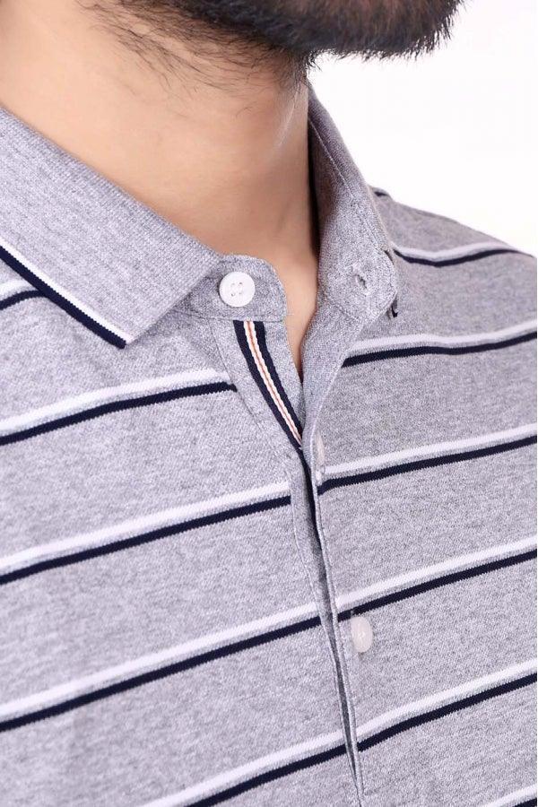 Grey striped polo T-shirt neckline with button placket and collar detail, close-up
