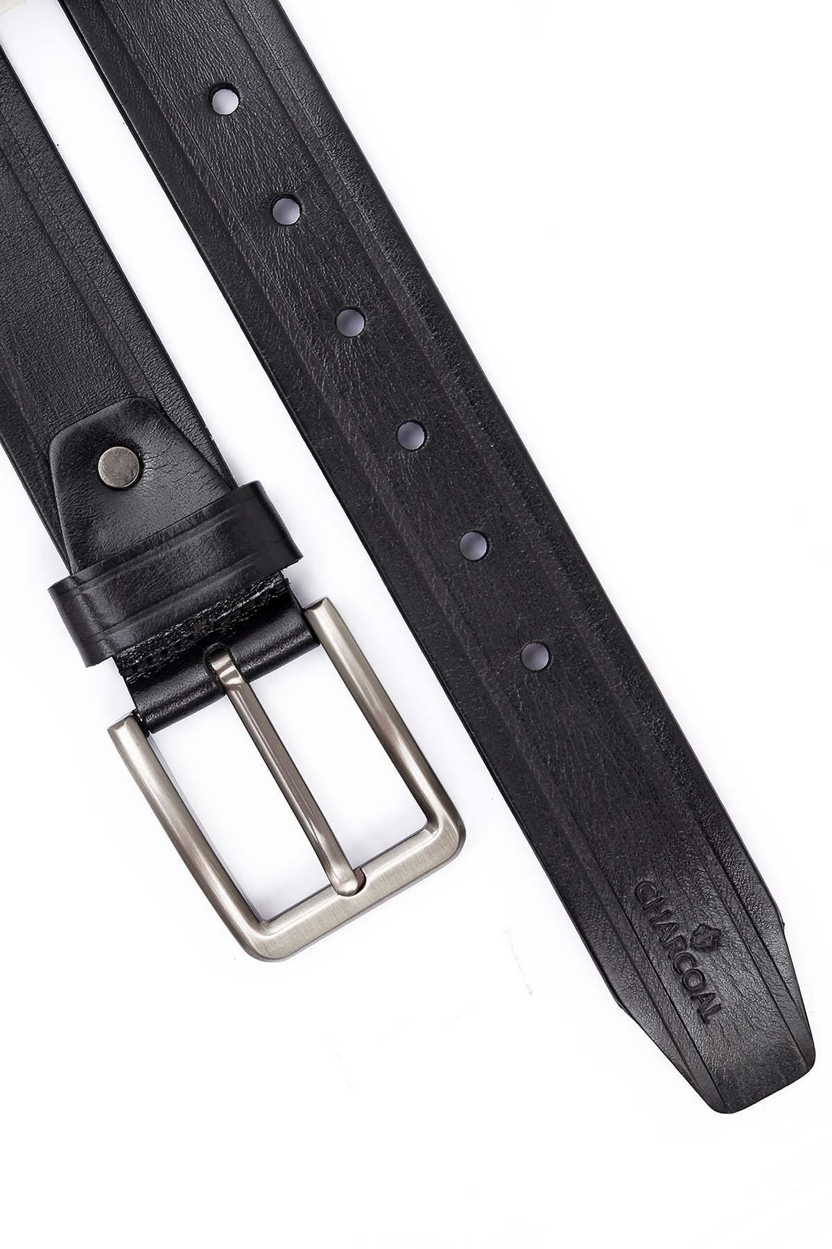 Dark leather belt with punched holes, silver buckle, and keeper strap.
