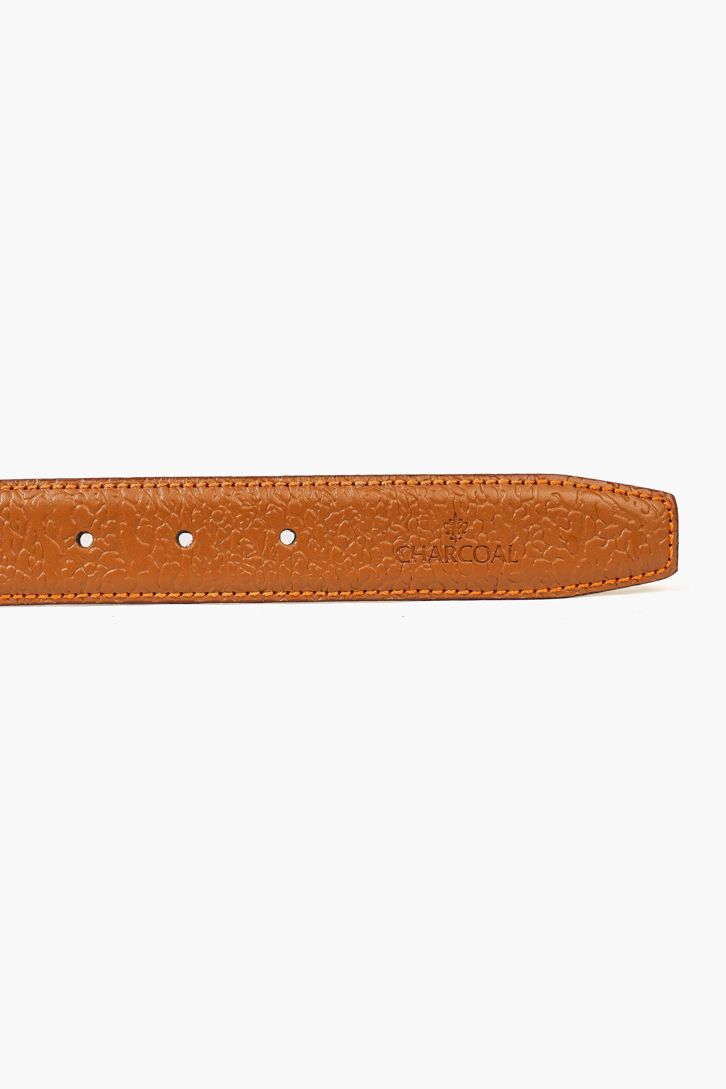 Brown leather belt strap with row of holes and embossed text