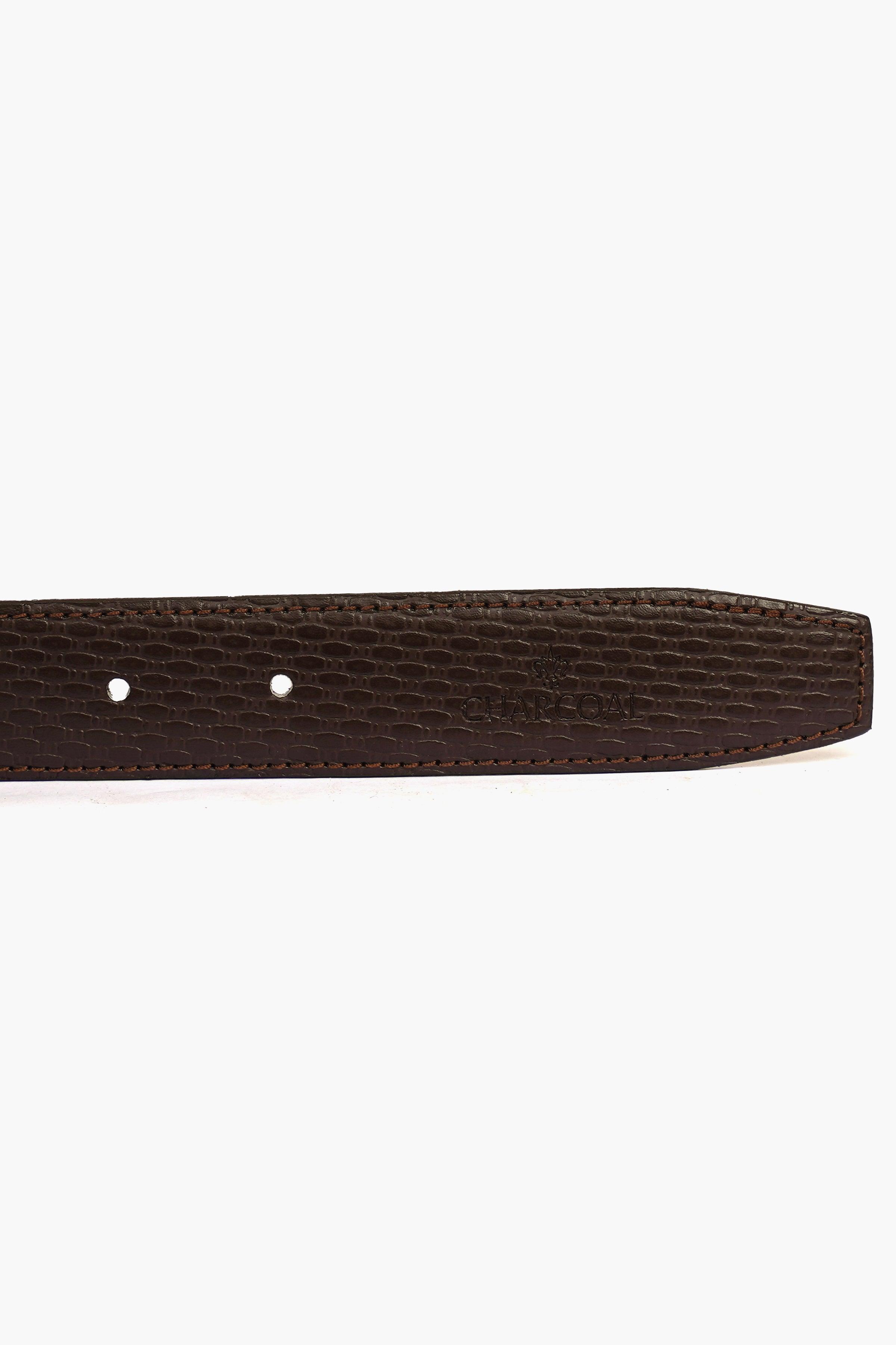 Brown leather belt strap with embossed texture and punched holes