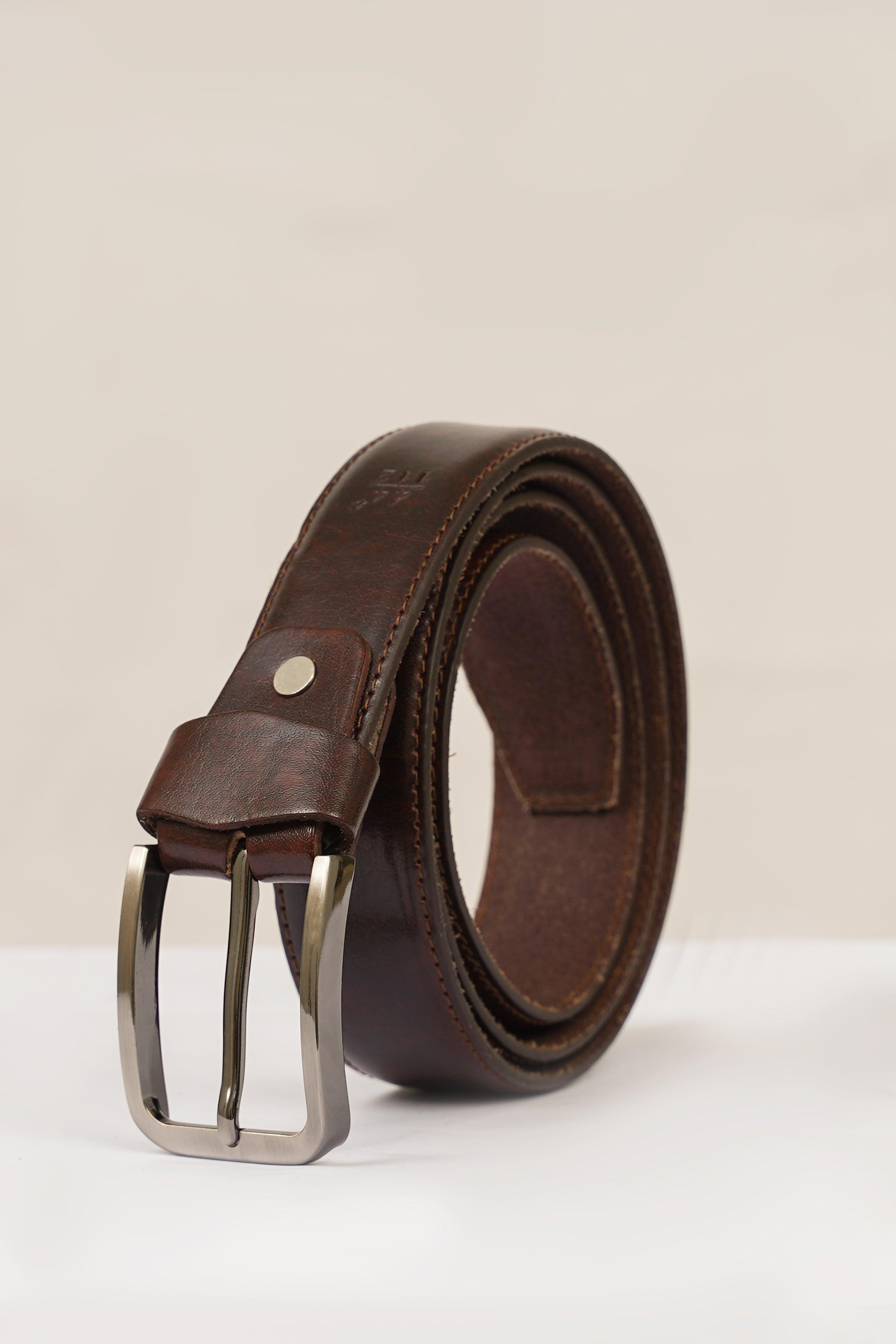 Brown leather belt with silver-tone buckle, stitched edges, and keeper strap