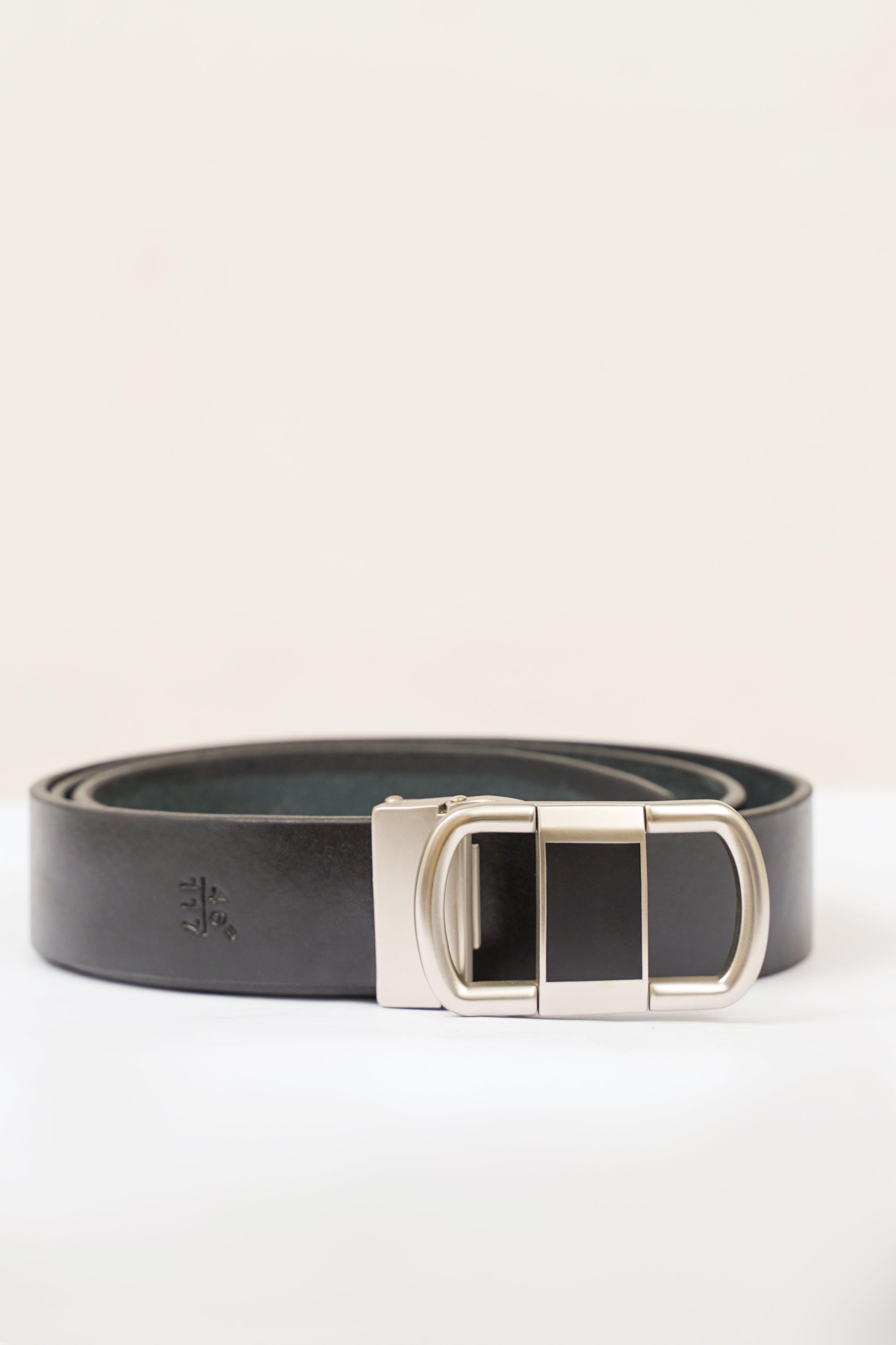 Dark formal belt with silver rectangular buckle and keeper