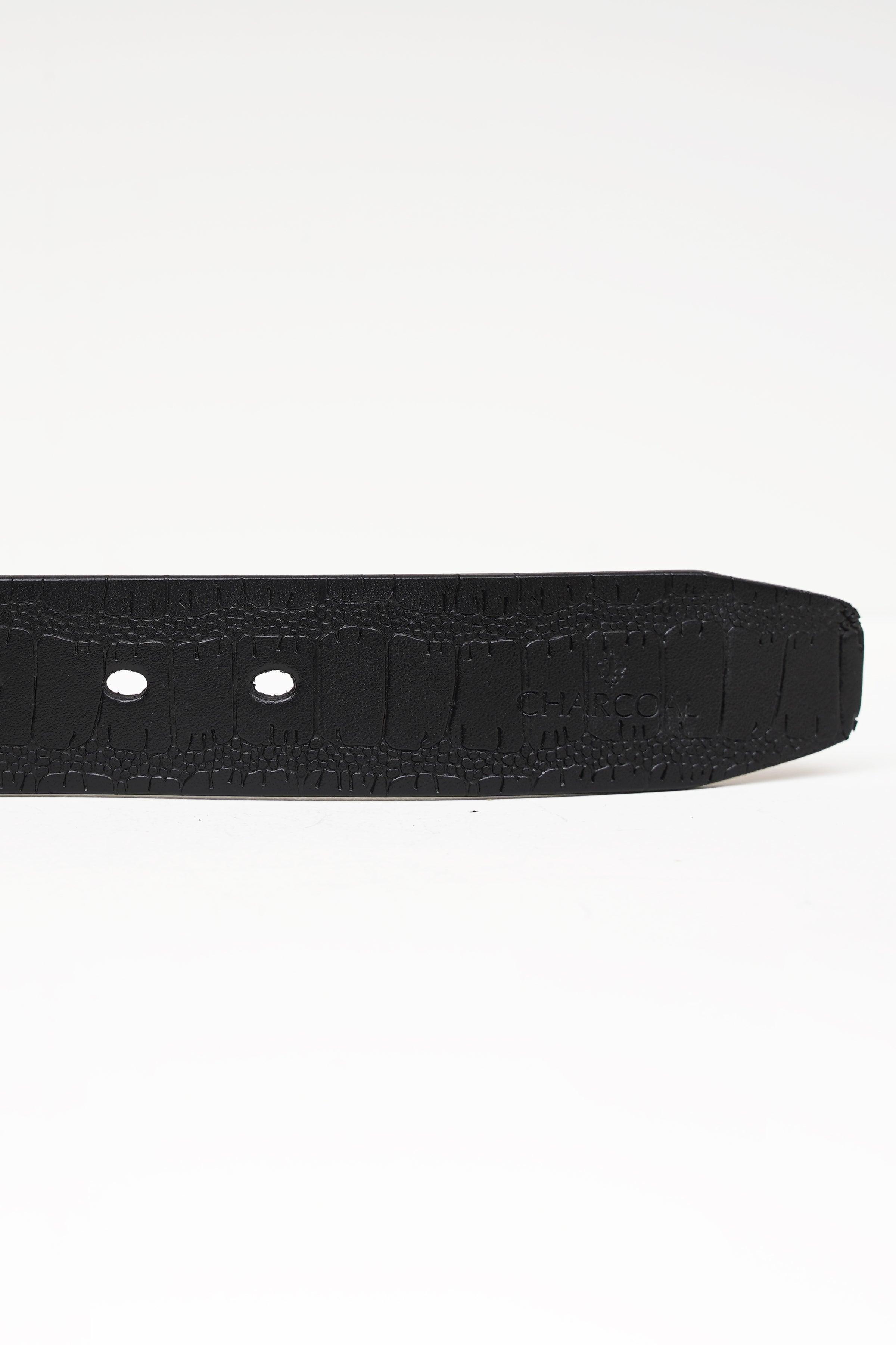 Black leather-look belt end with two metal rivets