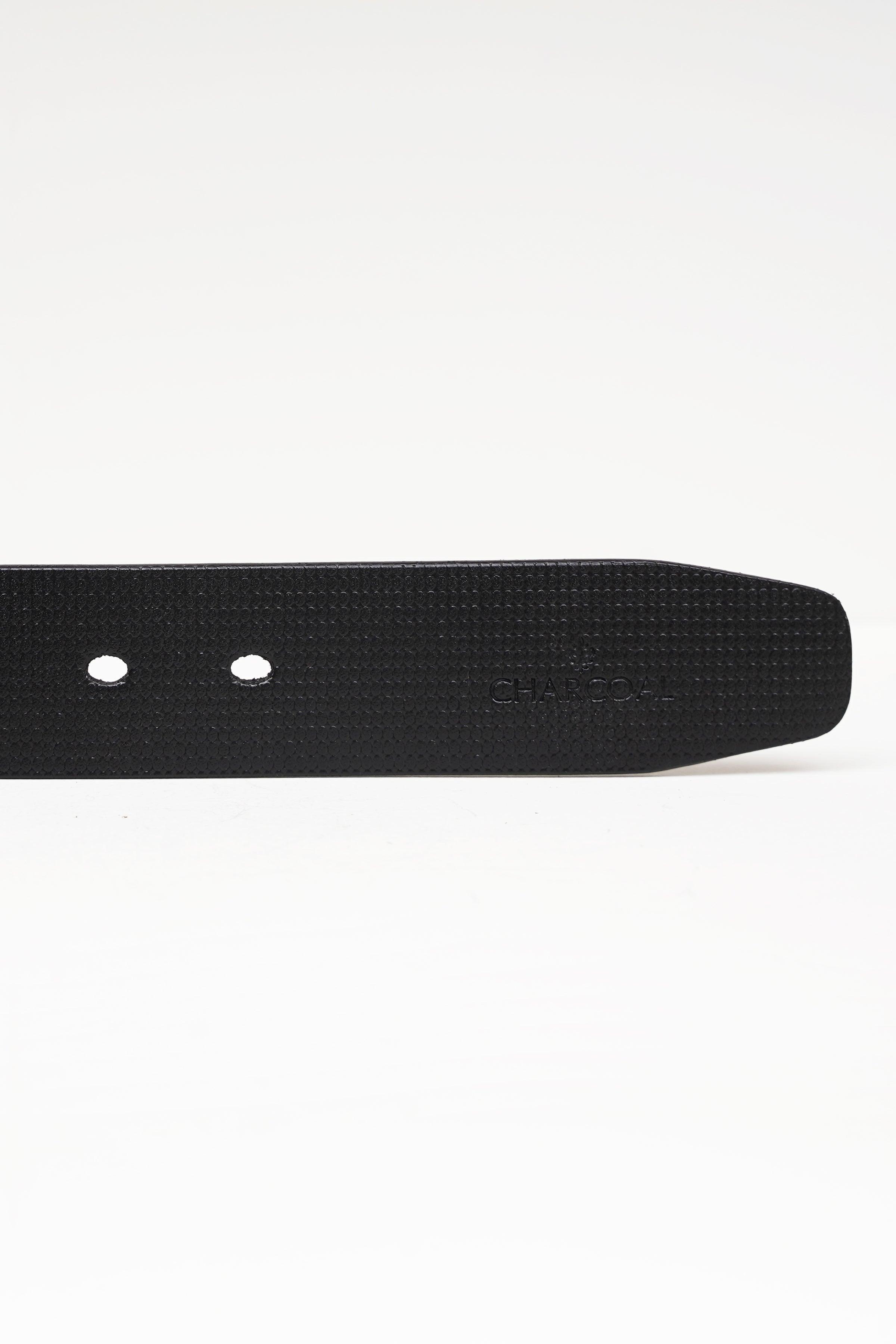 Black belt end with two rivet holes and textured stitched edge