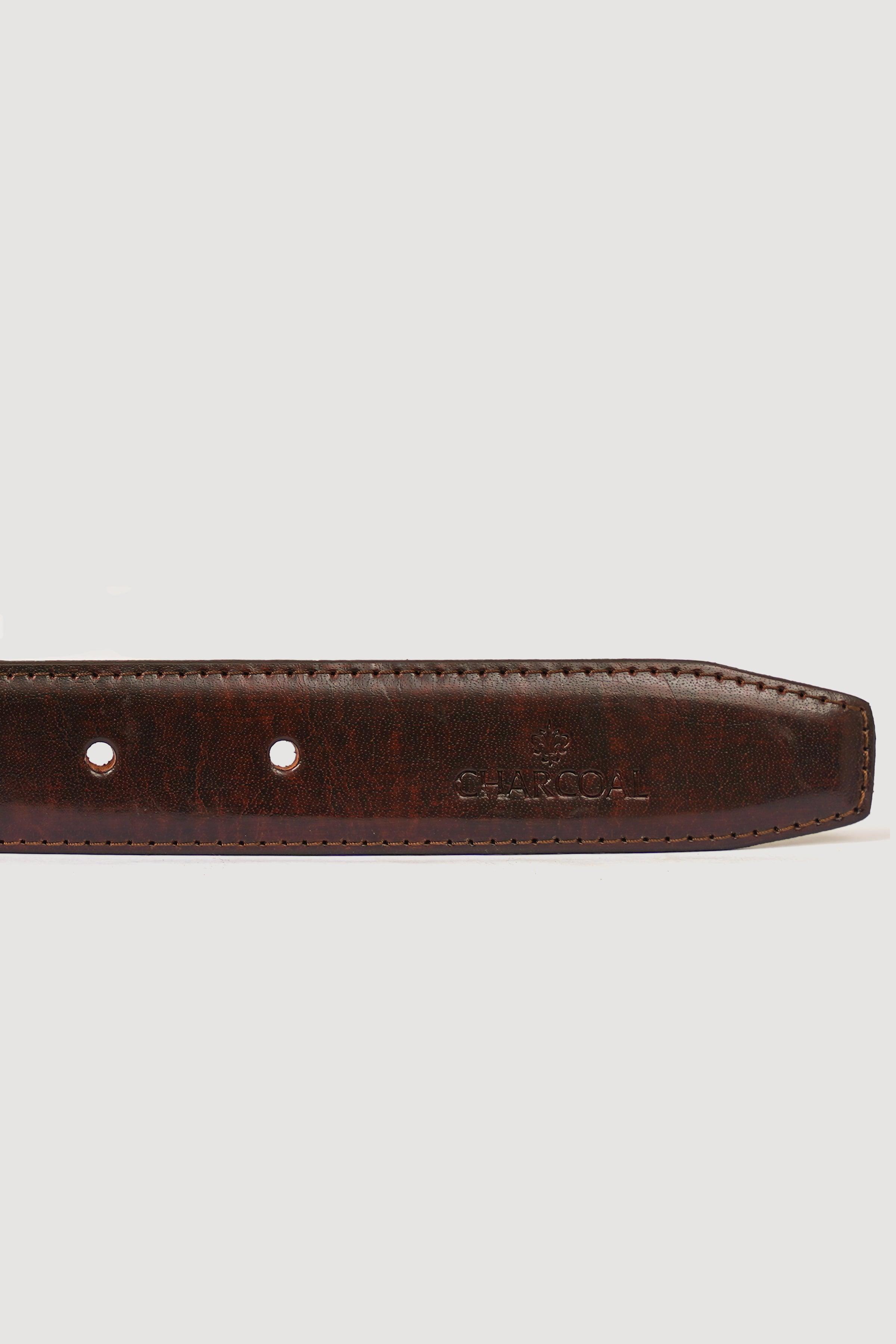 Brown leather belt strap end with two rivet holes and embossed logo