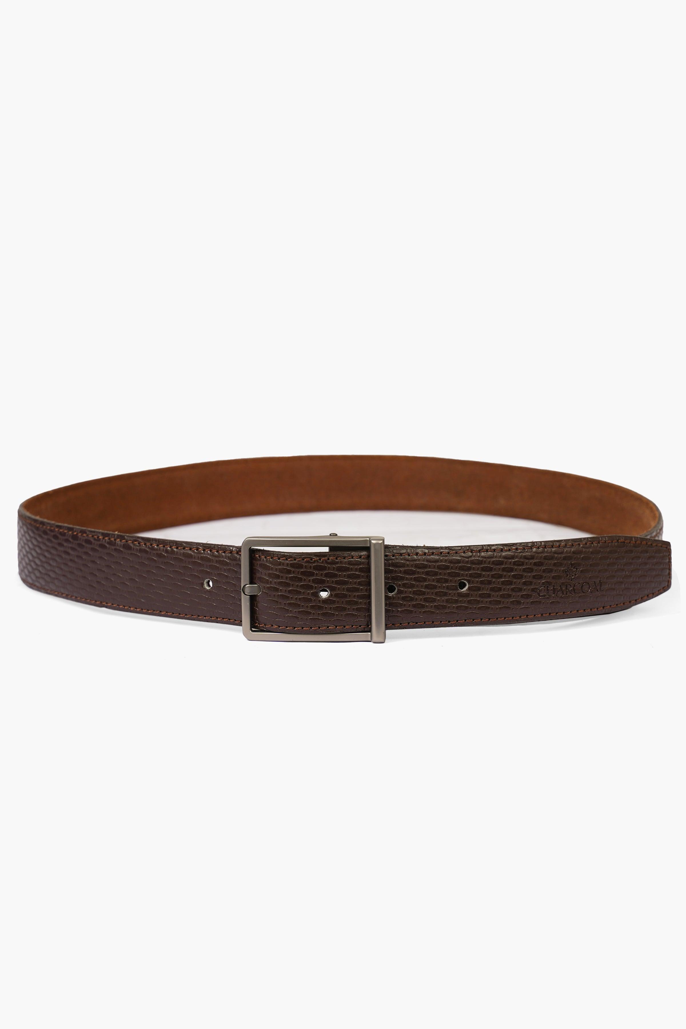 Brown leather belt with silver buckle and punched holes, adjustable strap