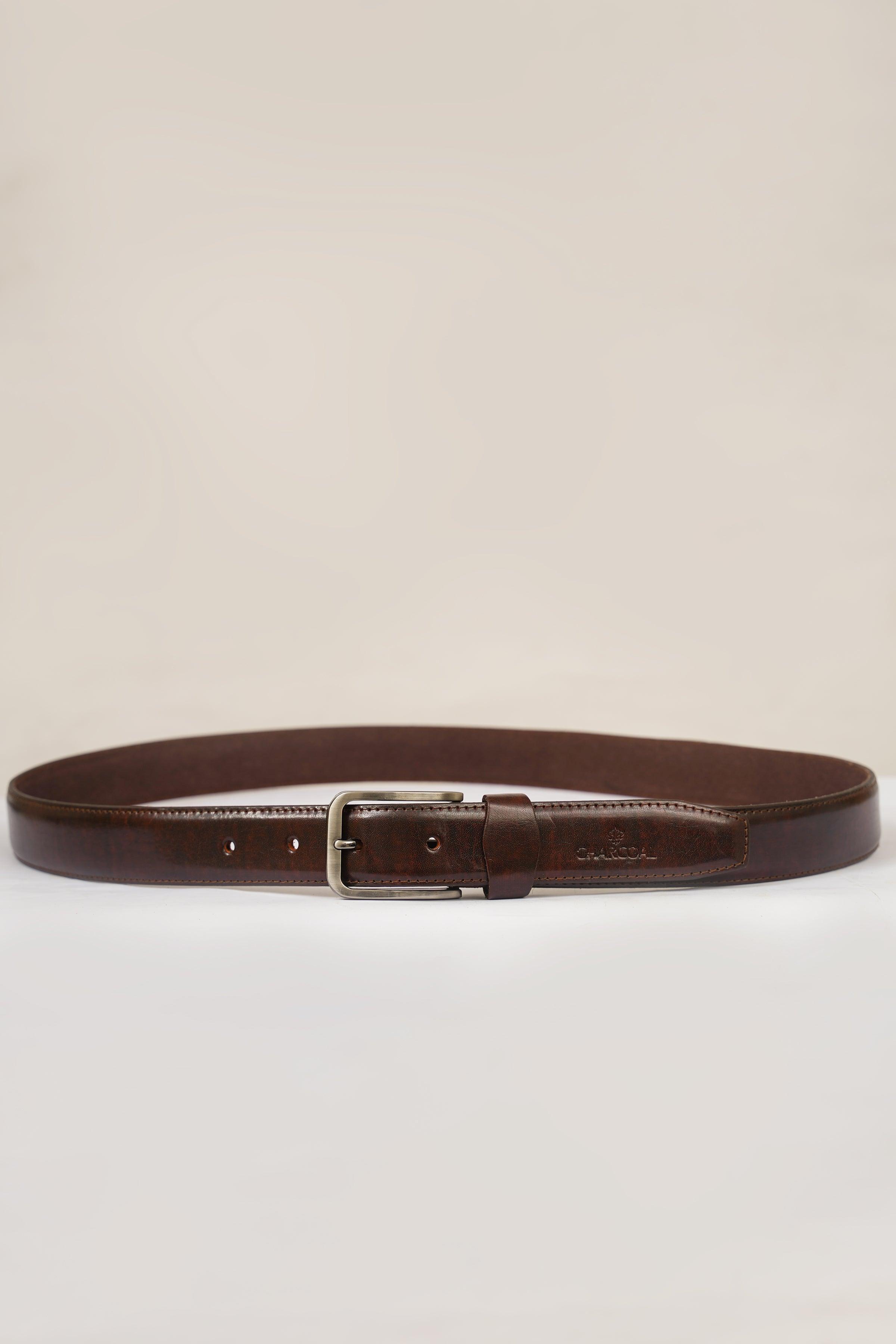 Brown leather belt with rectangular metal buckle and keeper loop