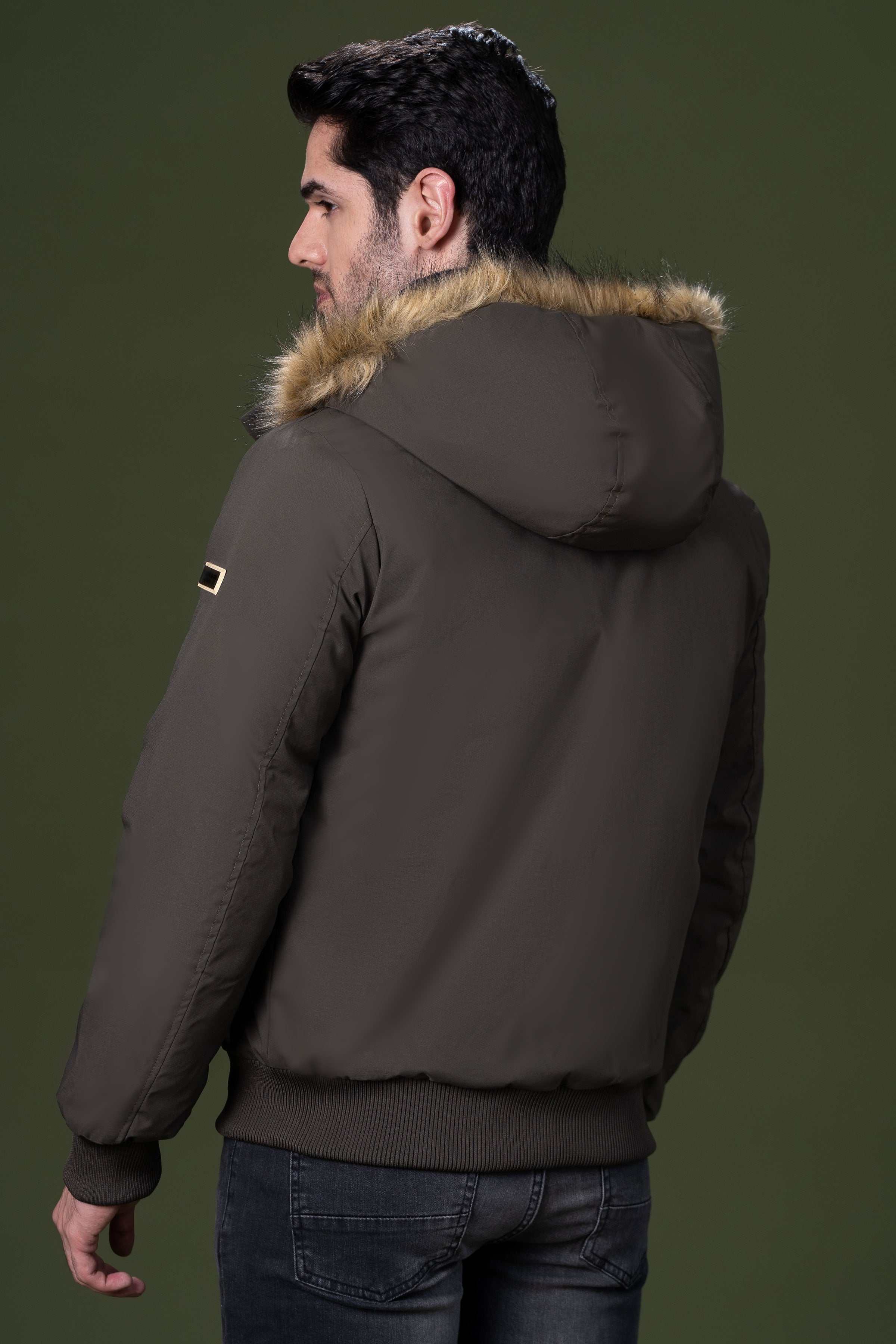Olive fur hooded jacket, back view with fluffy collar trim