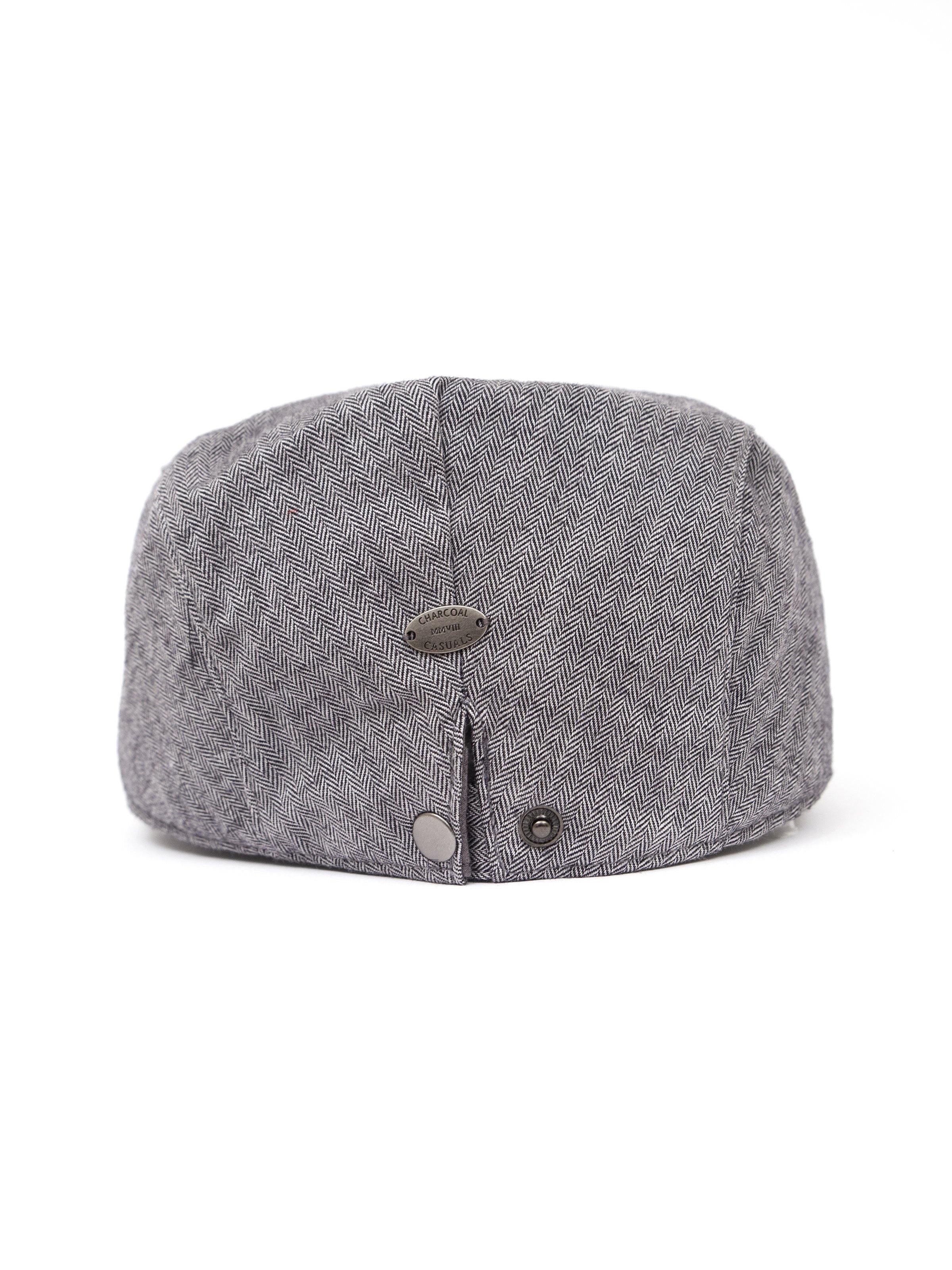 Gray golf cap back with button closure and ventilation grommet