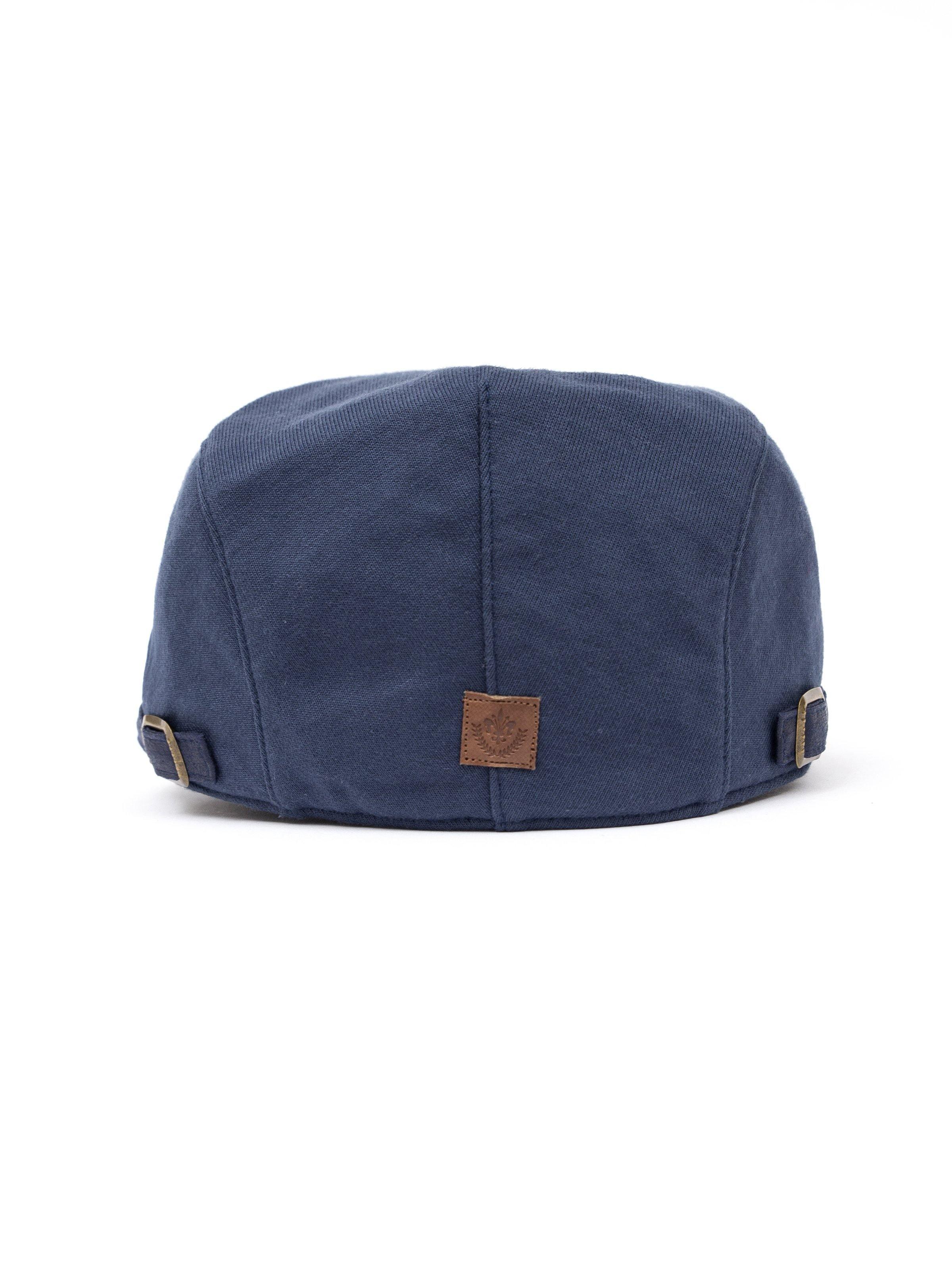 Navy golf cap back view with leather patch and adjustable strap tabs