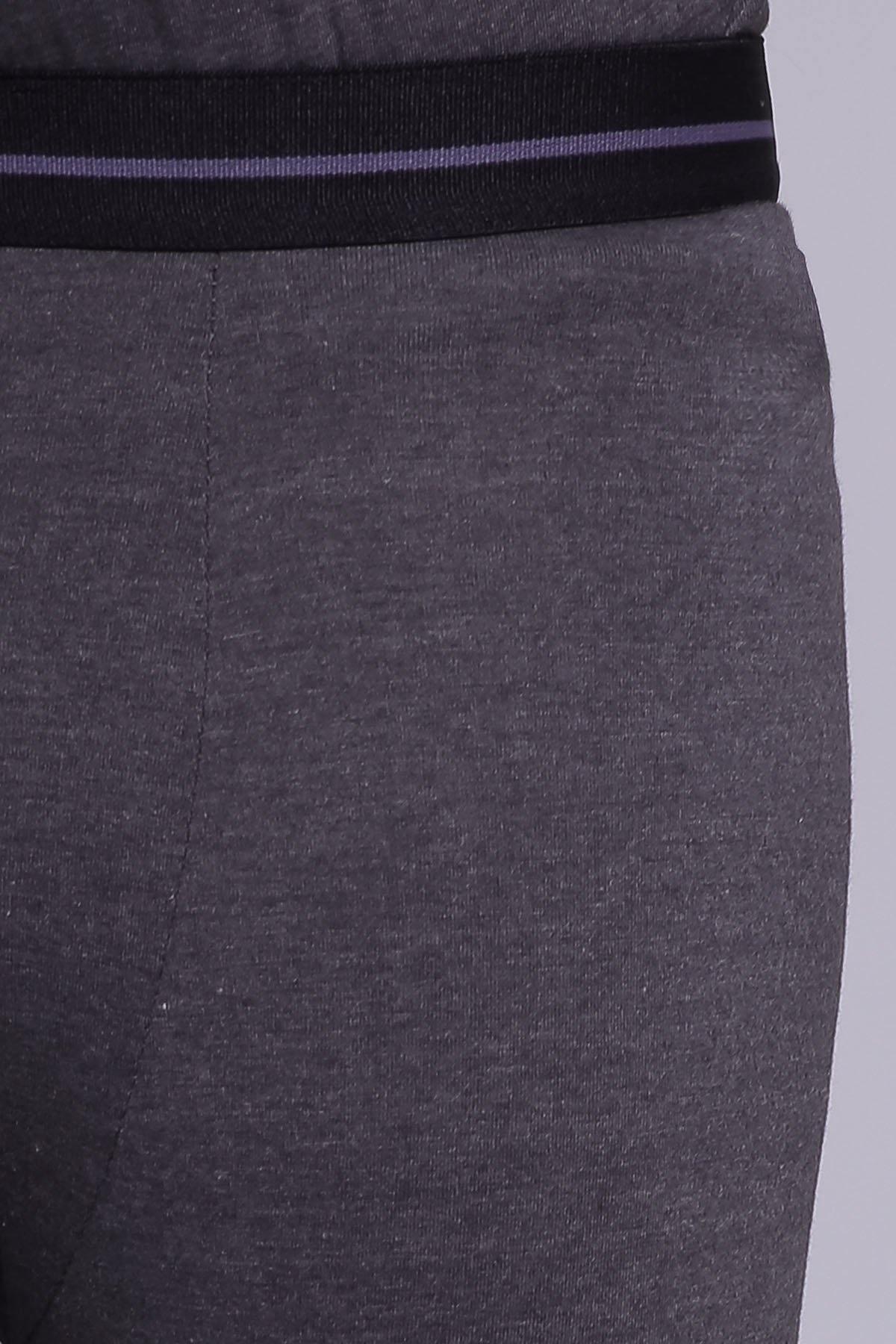 HEATTECH thermal legging fabric close-up with dark knit waistband band