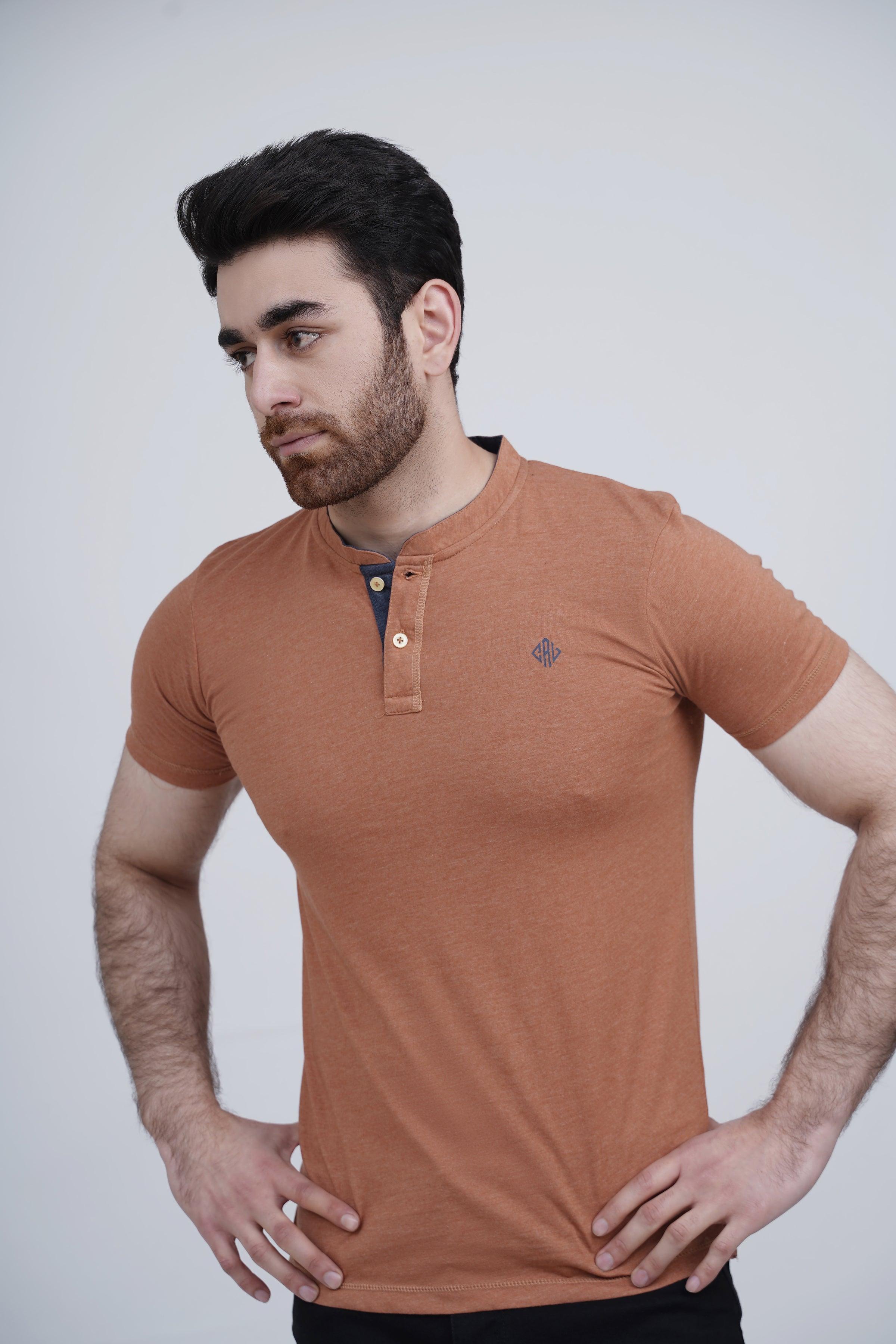 Rust henley T-shirt with short sleeves, button placket, small chest emblem