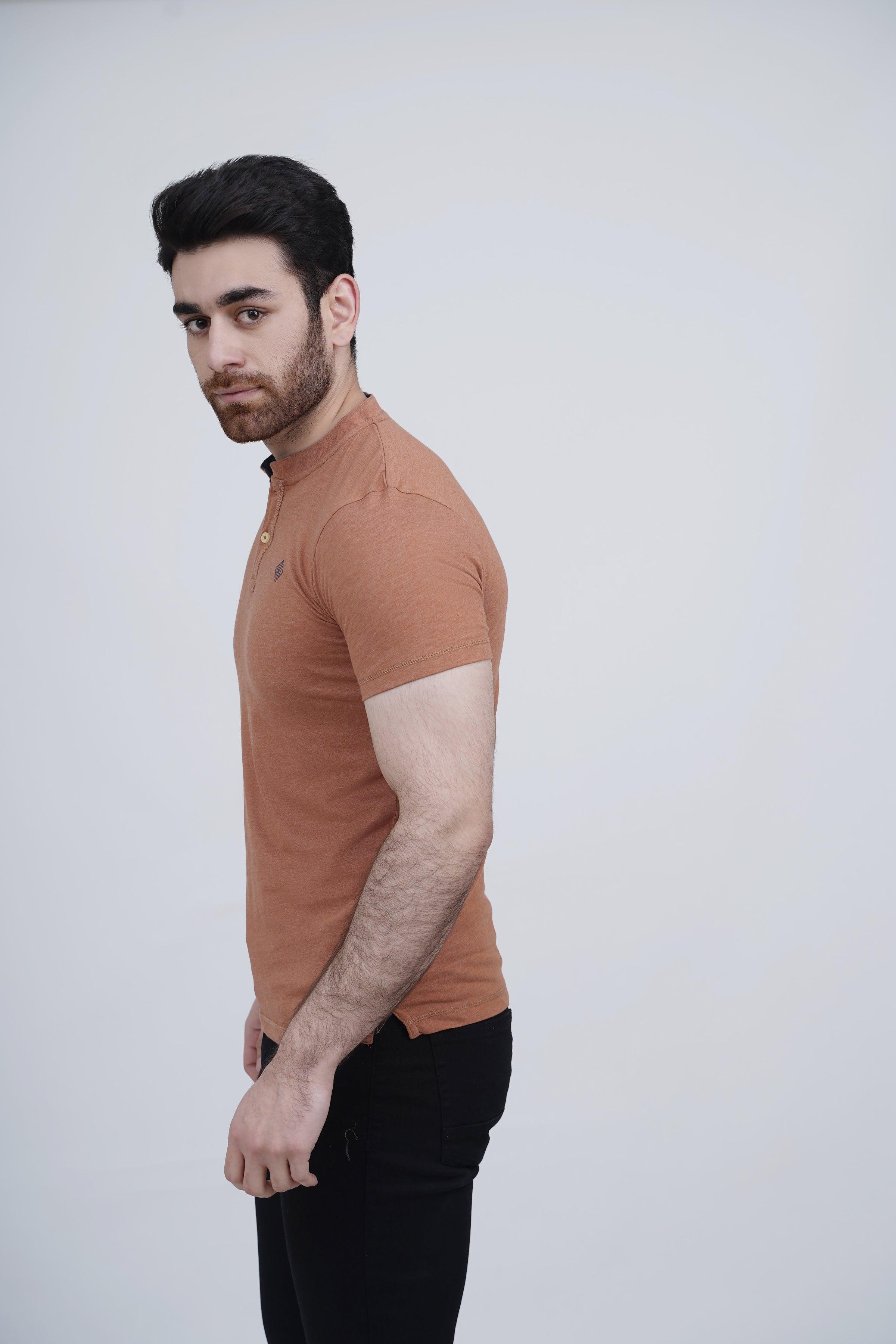 Rust henley T-shirt, short sleeves, side view; button placket and chest logo