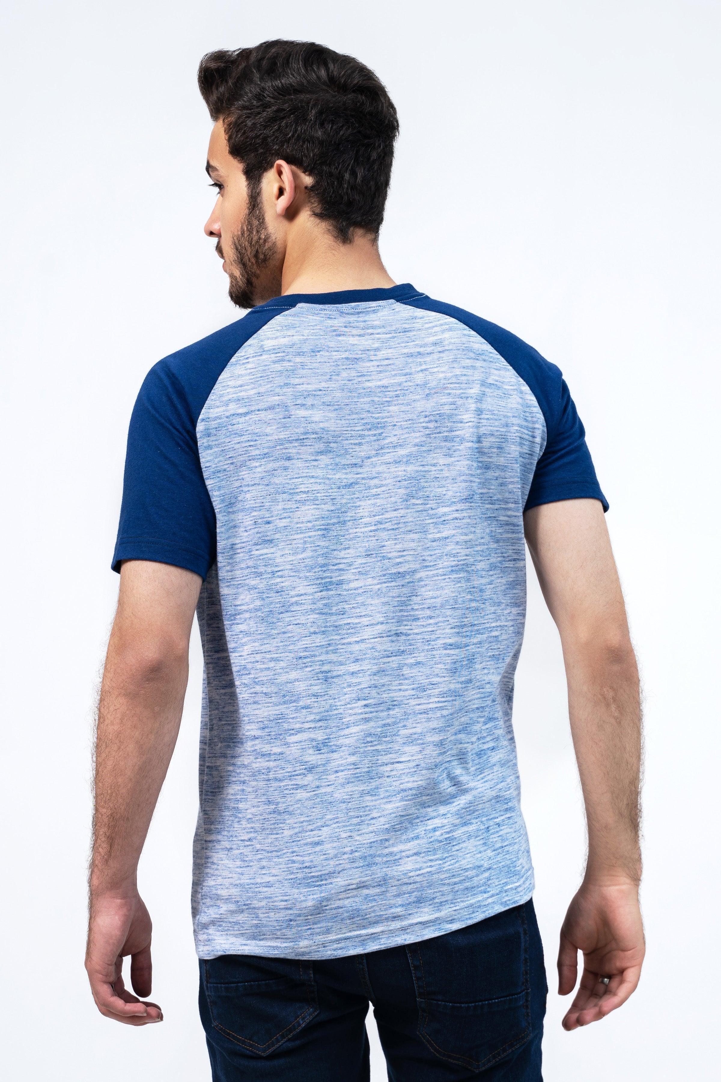 Back view of blue and heather gray raglan henley t-shirt with raglan sleeves