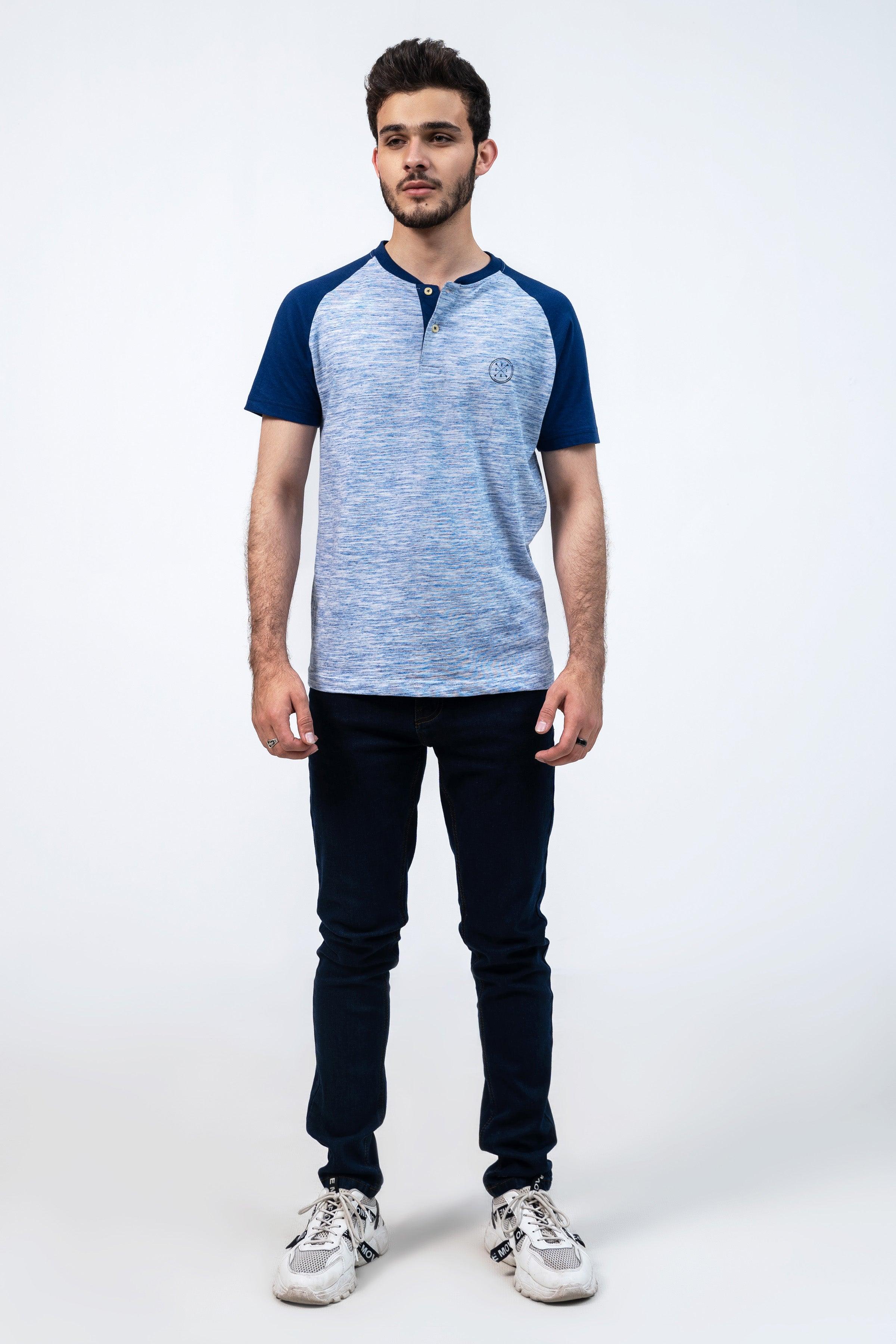 Blue and heather gray raglan henley t-shirt with short sleeves, button placket, and jeans