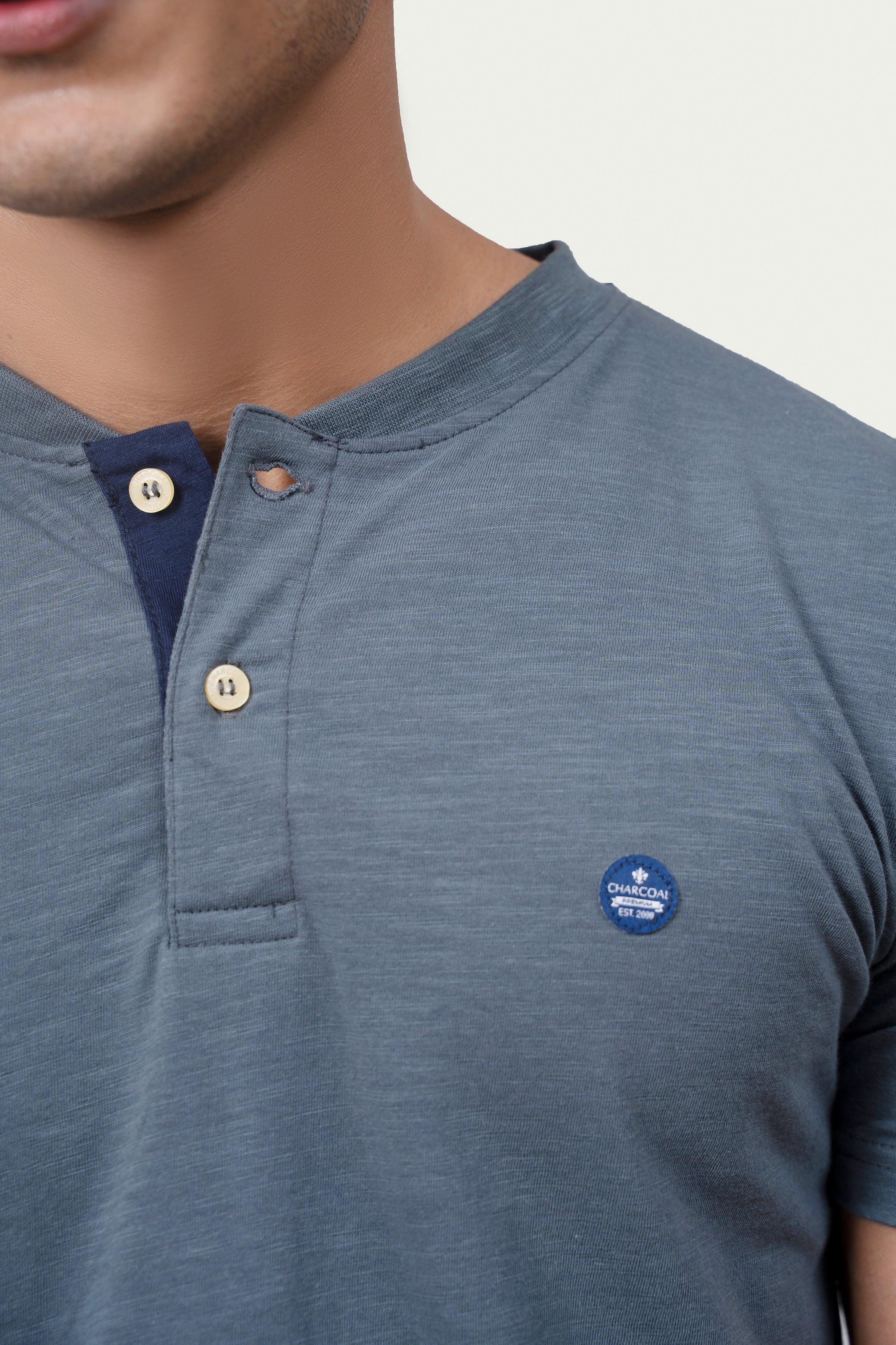 Grey henley neckline with 3-button placket and chest logo patch