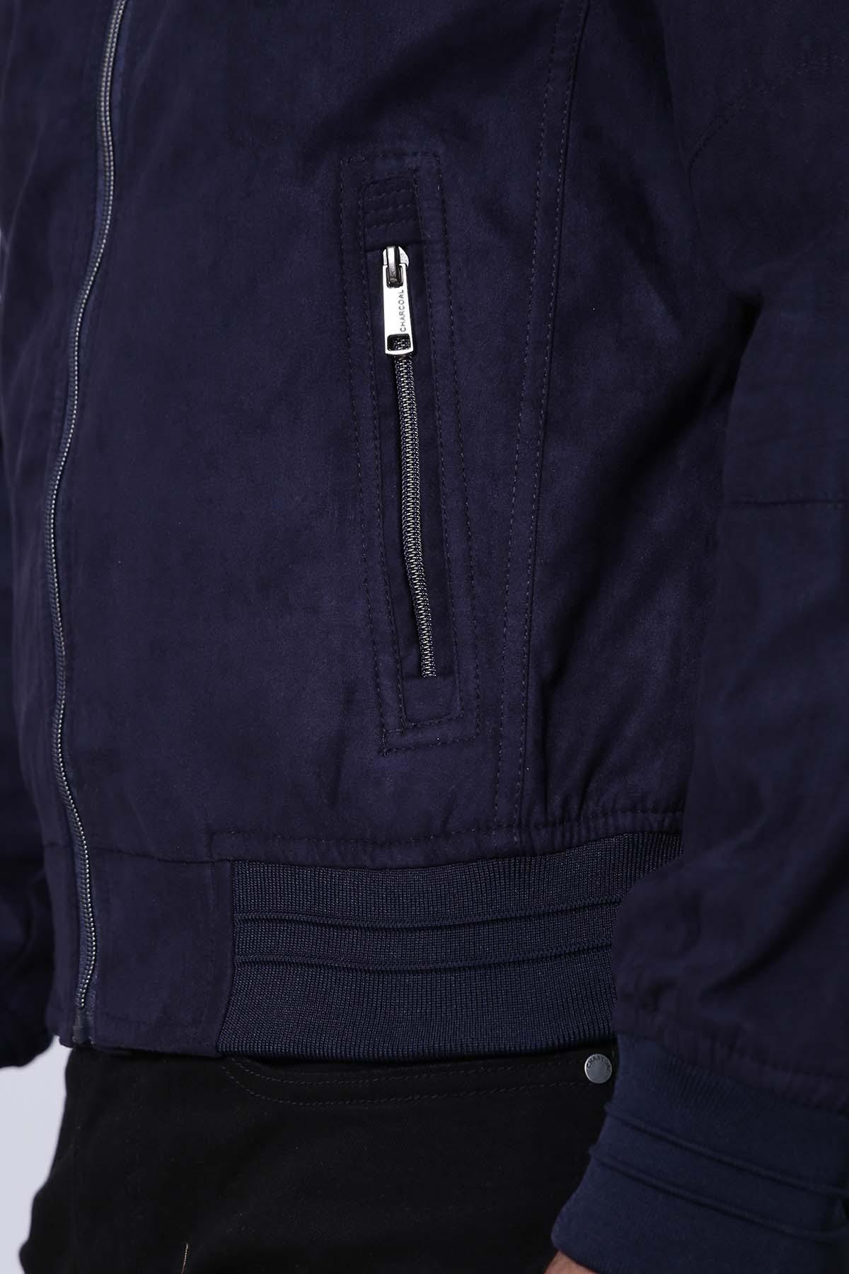 Navy full-sleeve jacket close-up: front zipper and ribbed hem