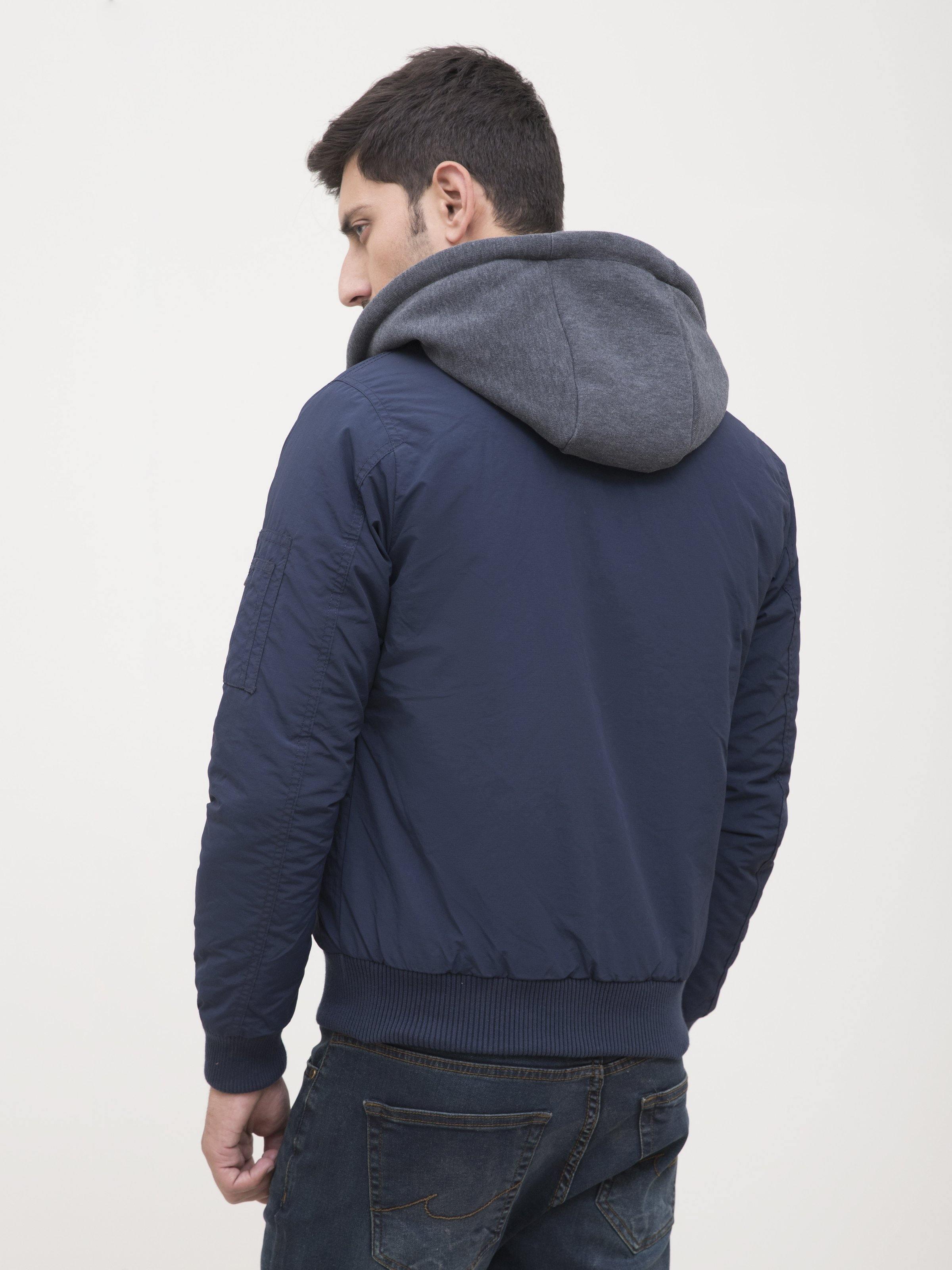 Navy full-sleeve jacket with gray hood lining, back view