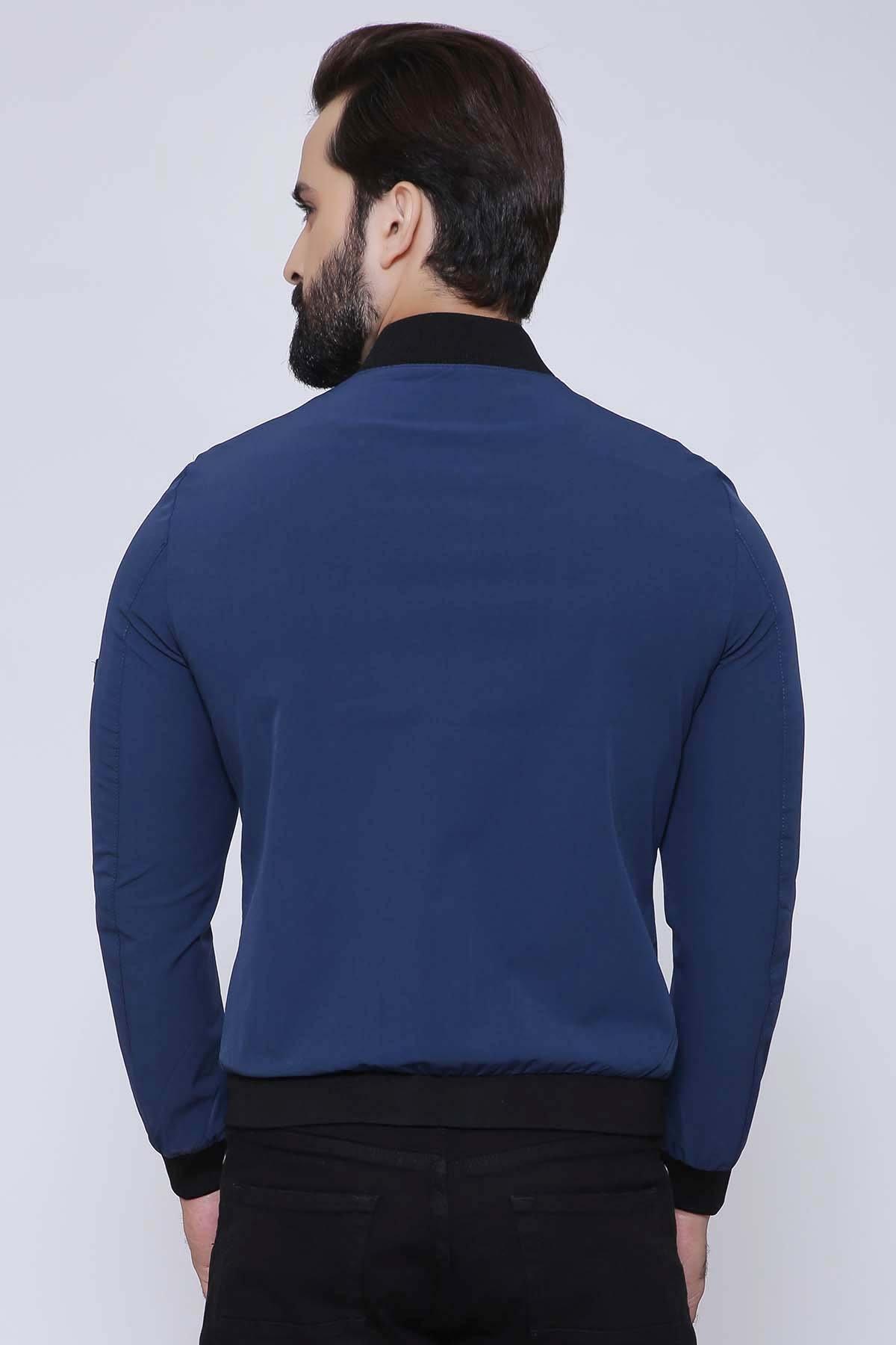 Navy zip-up jacket back view with ribbed waistband and cuffs