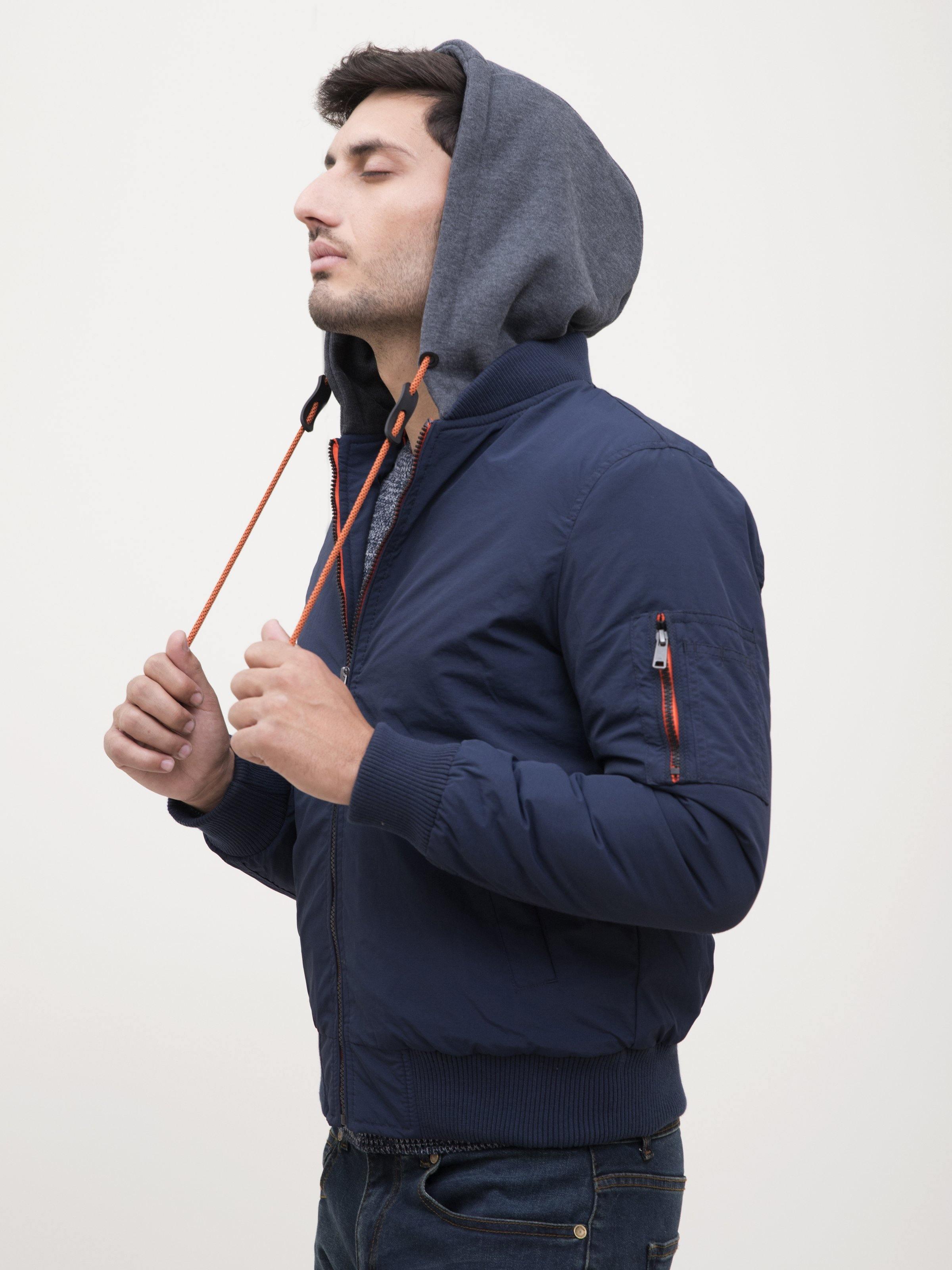 Navy hooded full-sleeve jacket with orange-trim drawstrings and zip pocket on sleeve