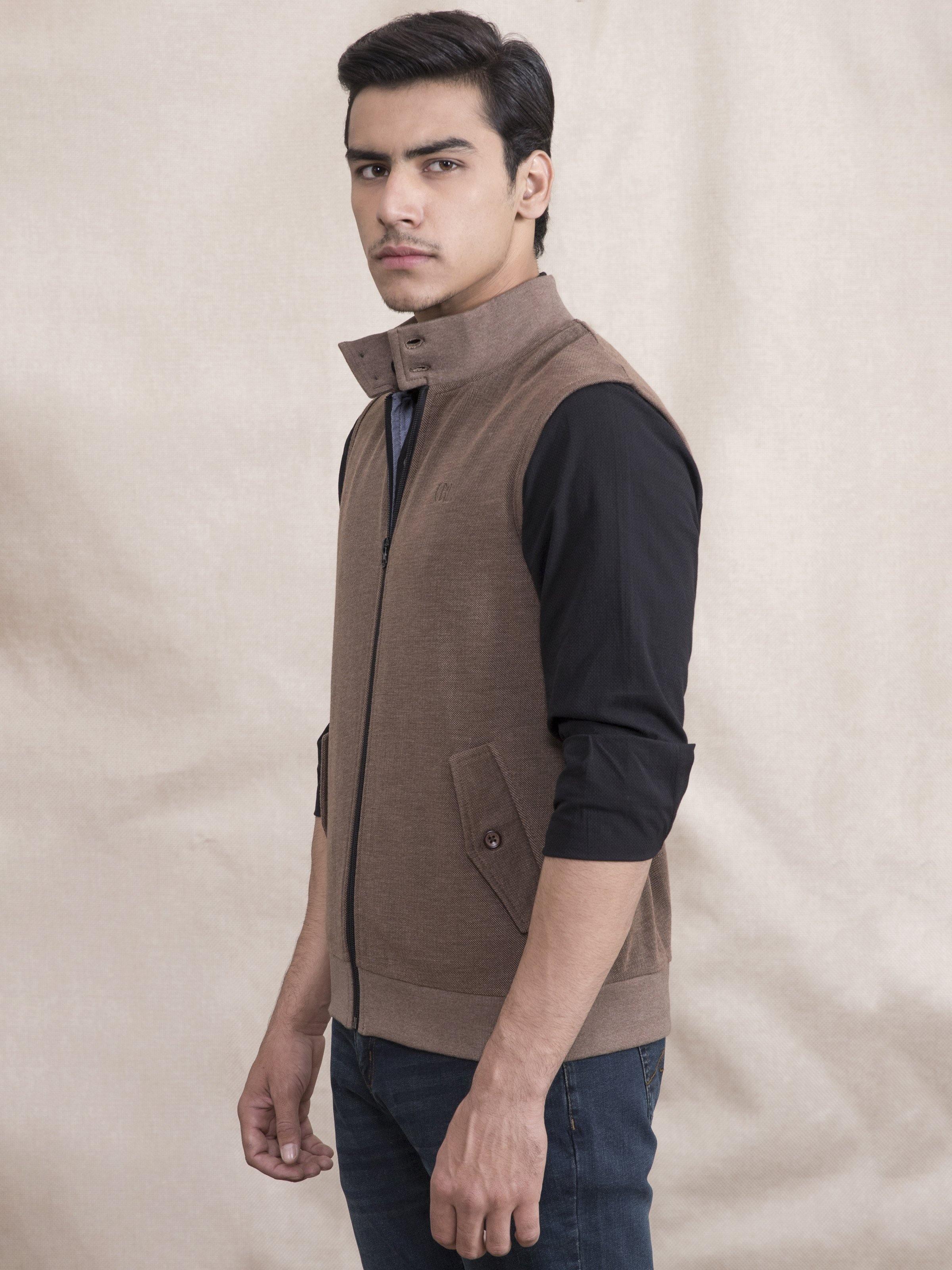 Brown sleeveless jacket with stand collar and snap button pockets