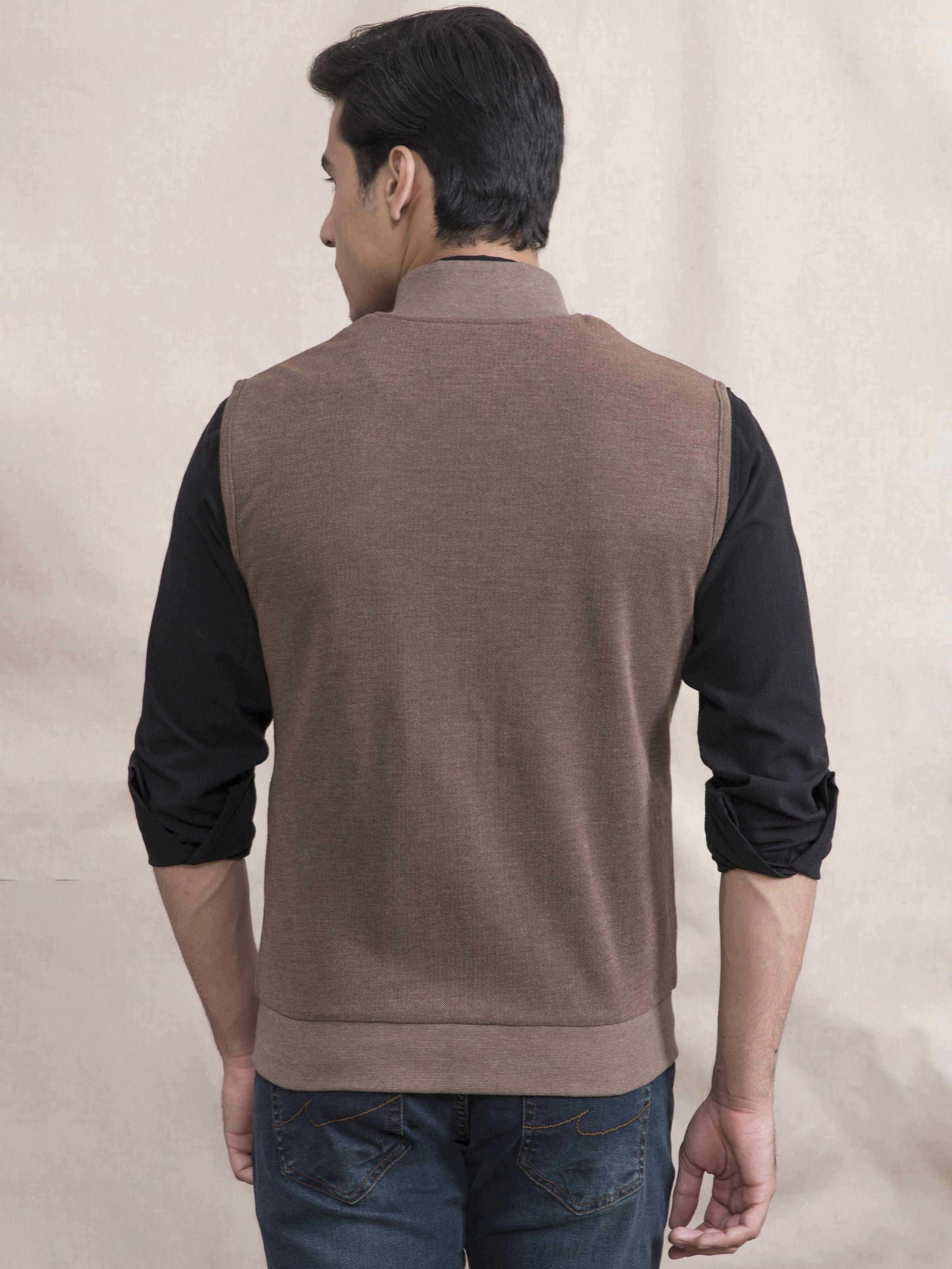 Brown sleeveless jacket, back view with zipper and yoke seam