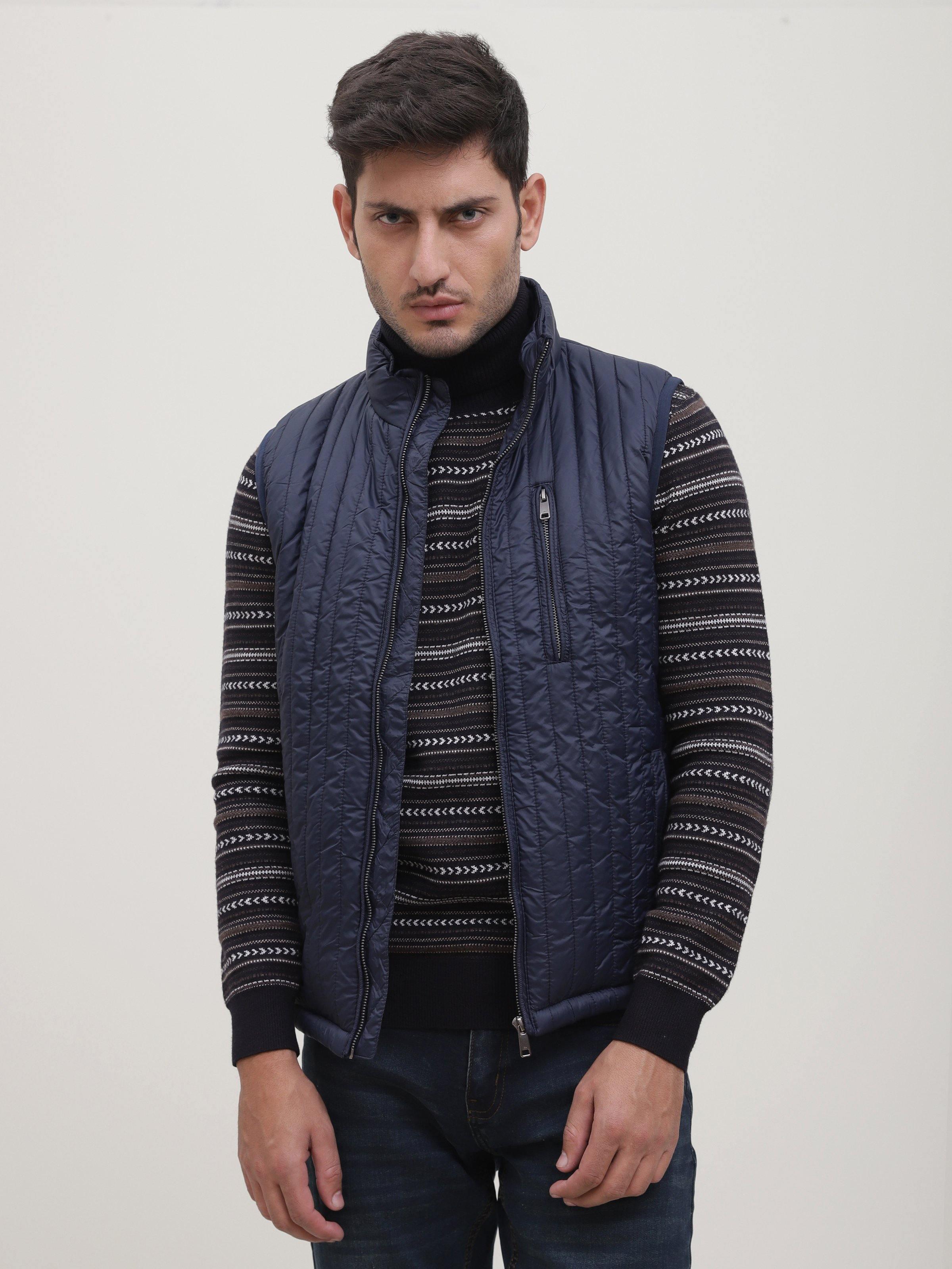 Men's navy sleeveless quilted jacket with front zipper and stand collar