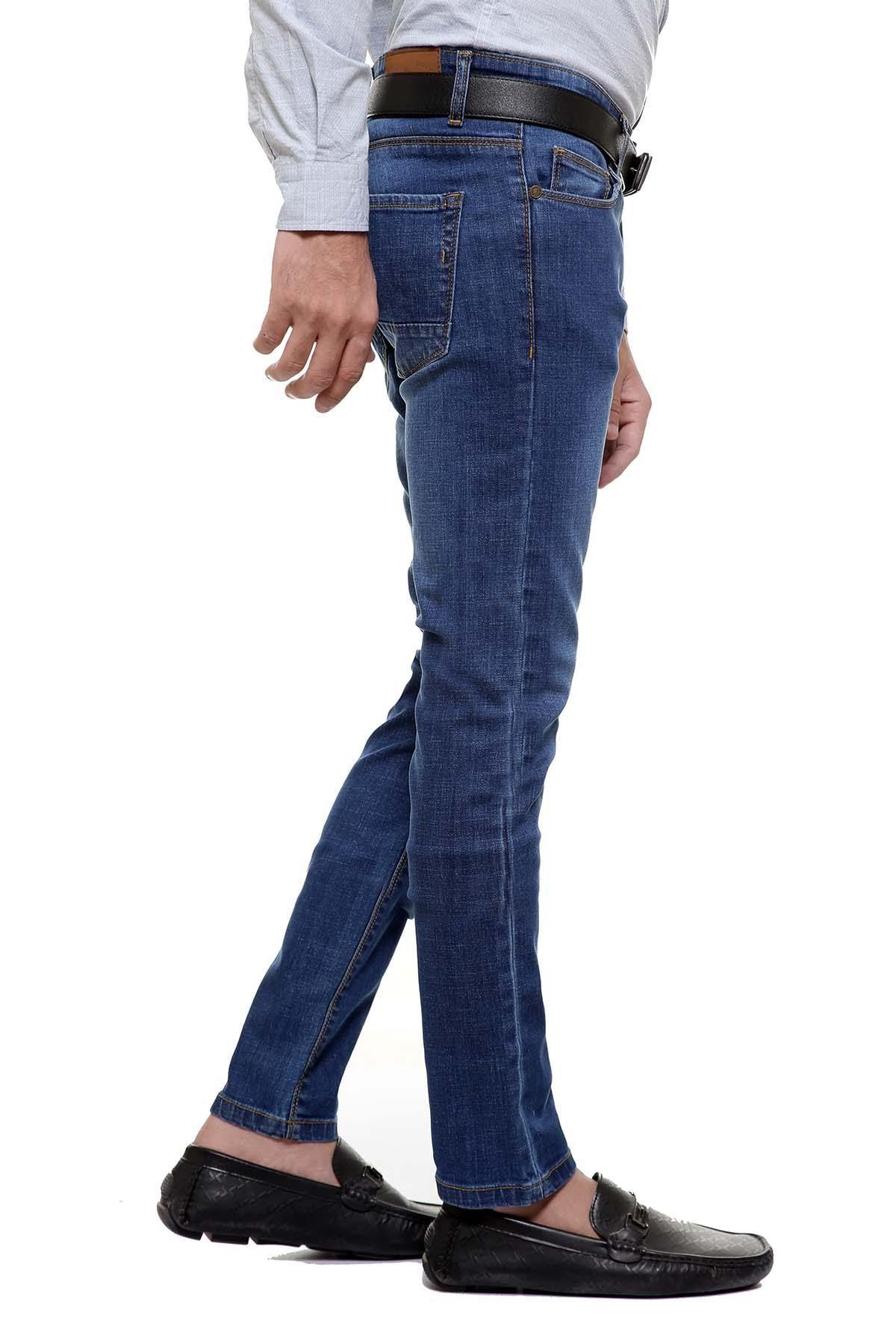 Light blue skinny fit jeans, angled view showing slim tapered legs and belt loops