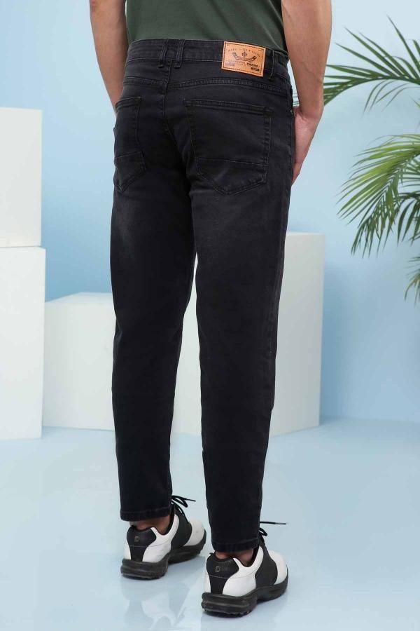 Dark slim-fit jeans with contrast stitching and back leather patch