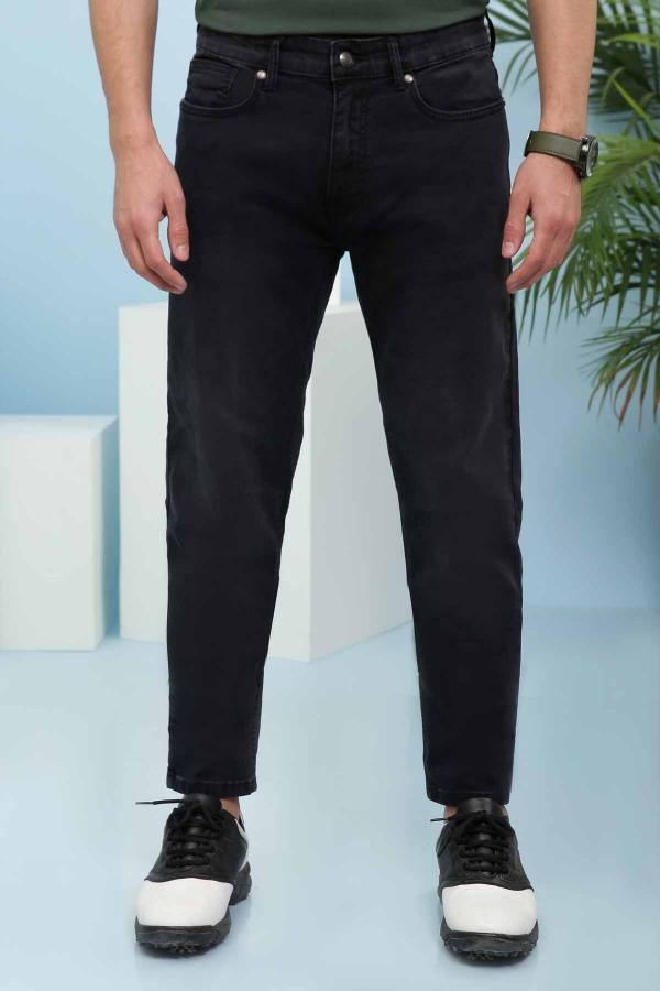 Dark slim-fit jeans with five-pocket design and button-and-zip closure