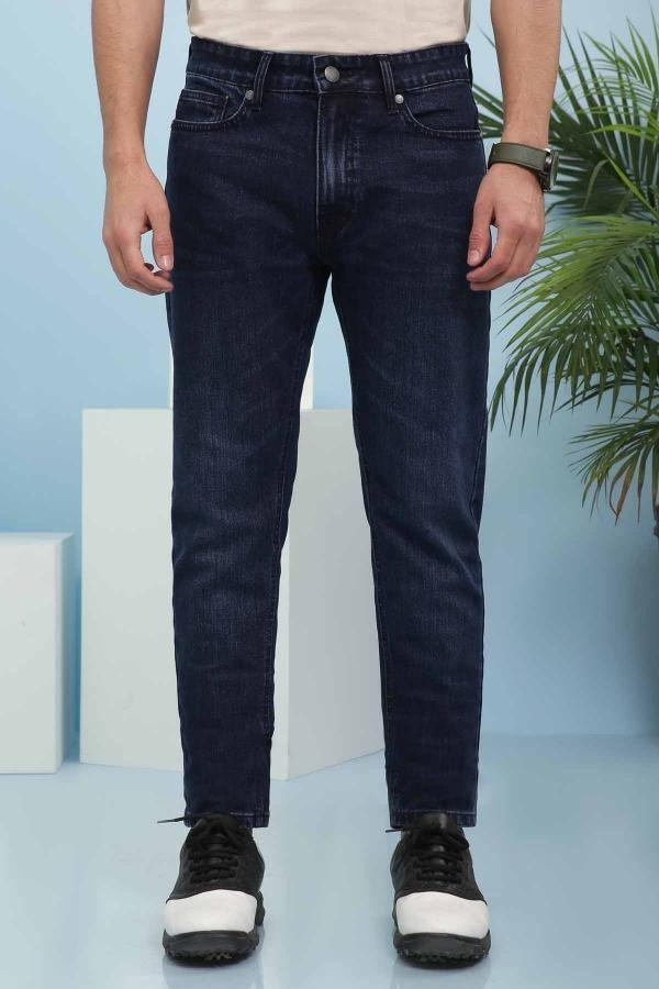 Dark blue slim-fit jeans with button fly and five-pocket design