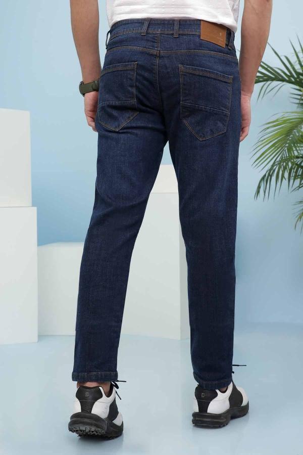 Slim fit dark blue jeans, back view with belt loops and back pockets