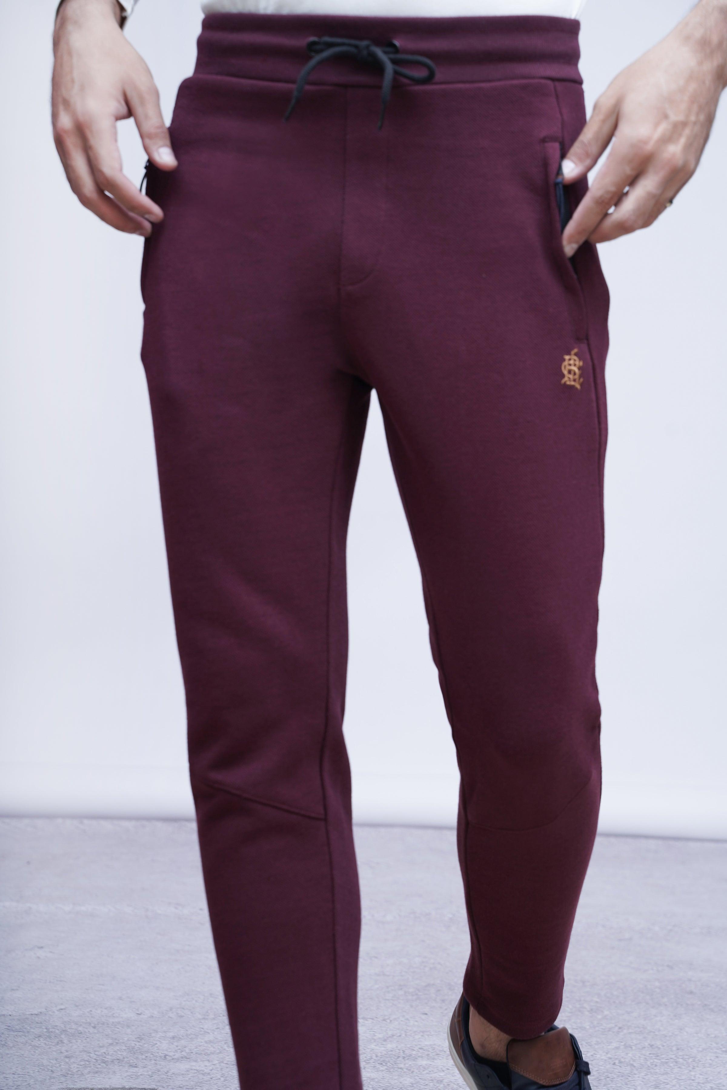 Maroon pique trousers with front hand pockets and drawstring waist