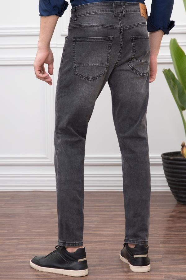 Dark grey slim-fit jeans with back yoke and two back pockets, full-body view